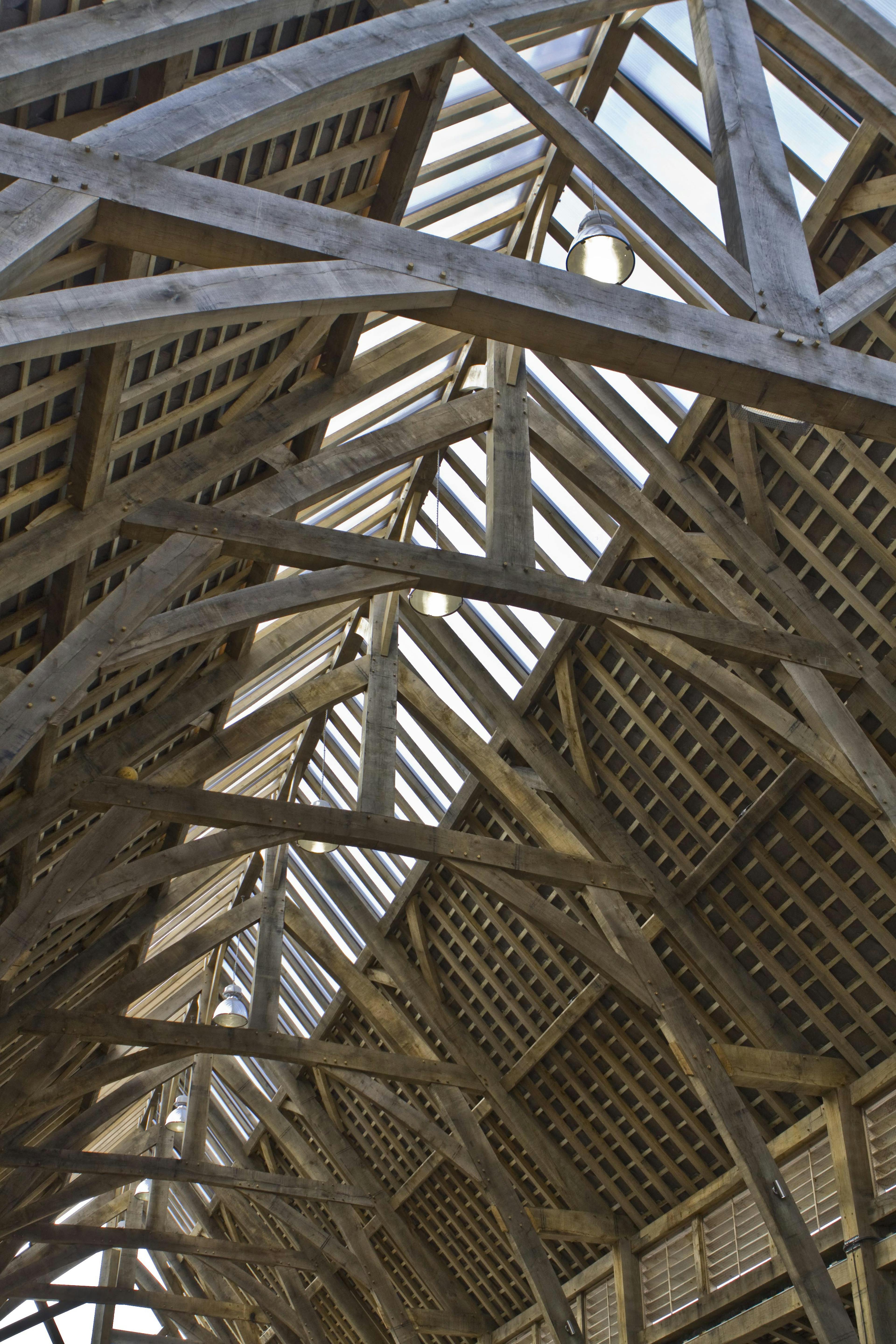 Entrance to the green oak frame structure at Penistone Market in Yorkshire, showcasing the impressive timber framing and inviting design