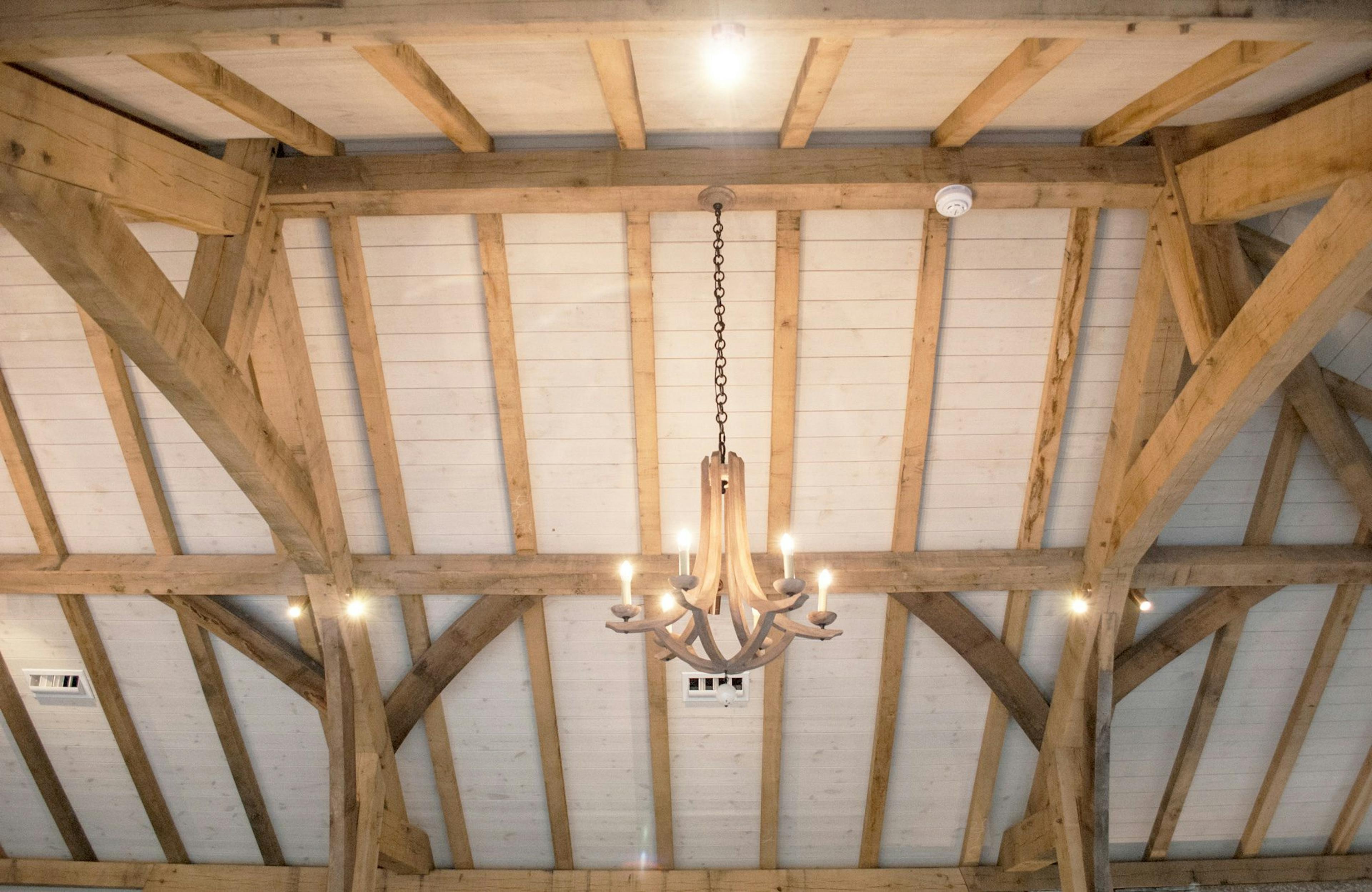 Painted softwood boarding inside a structural oak frame