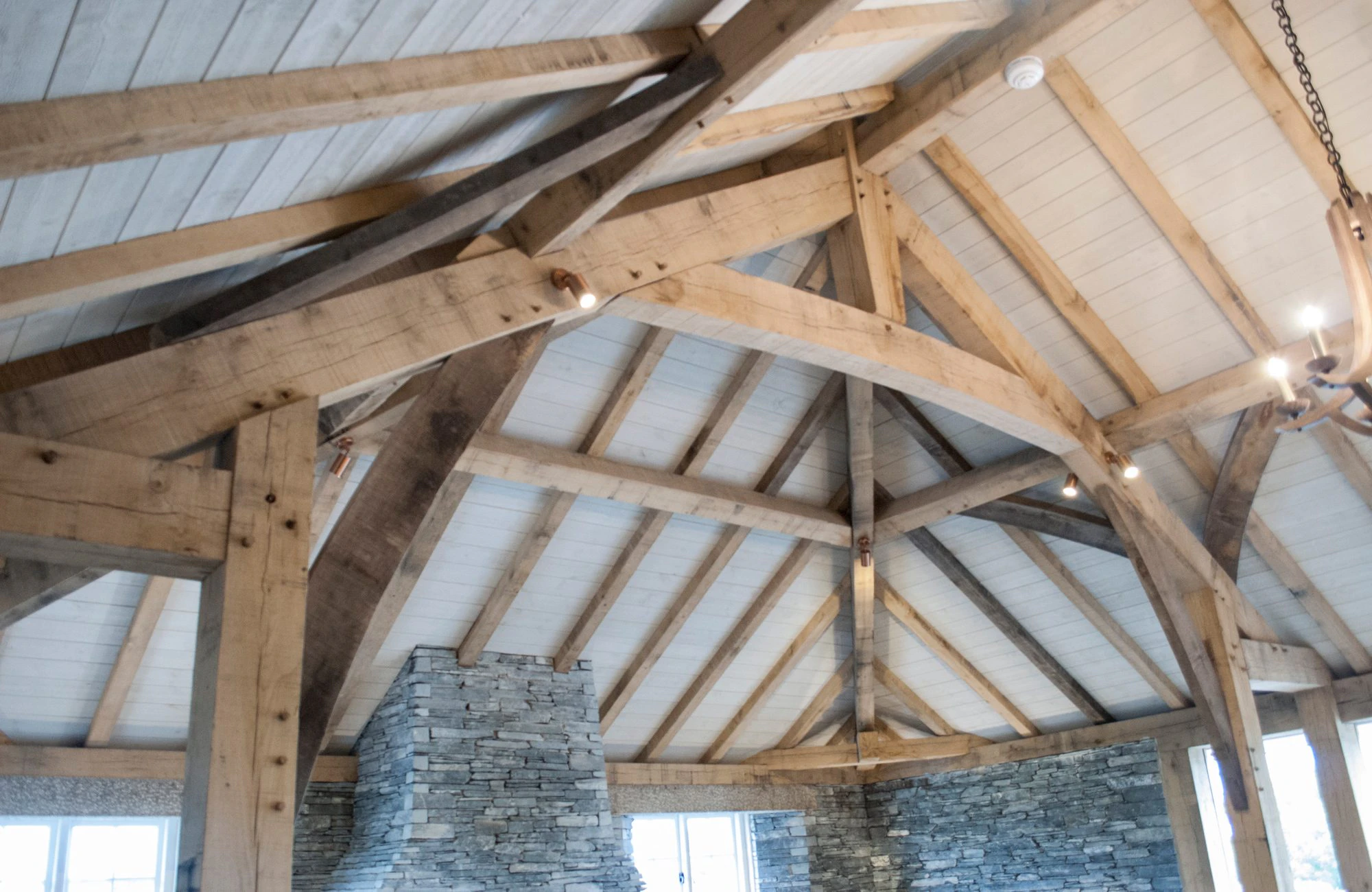 Oak-framed roof structure inside Rick Stein's Cornish Arms pub, highlighting the exposed timber beams and traditional craftsmanship