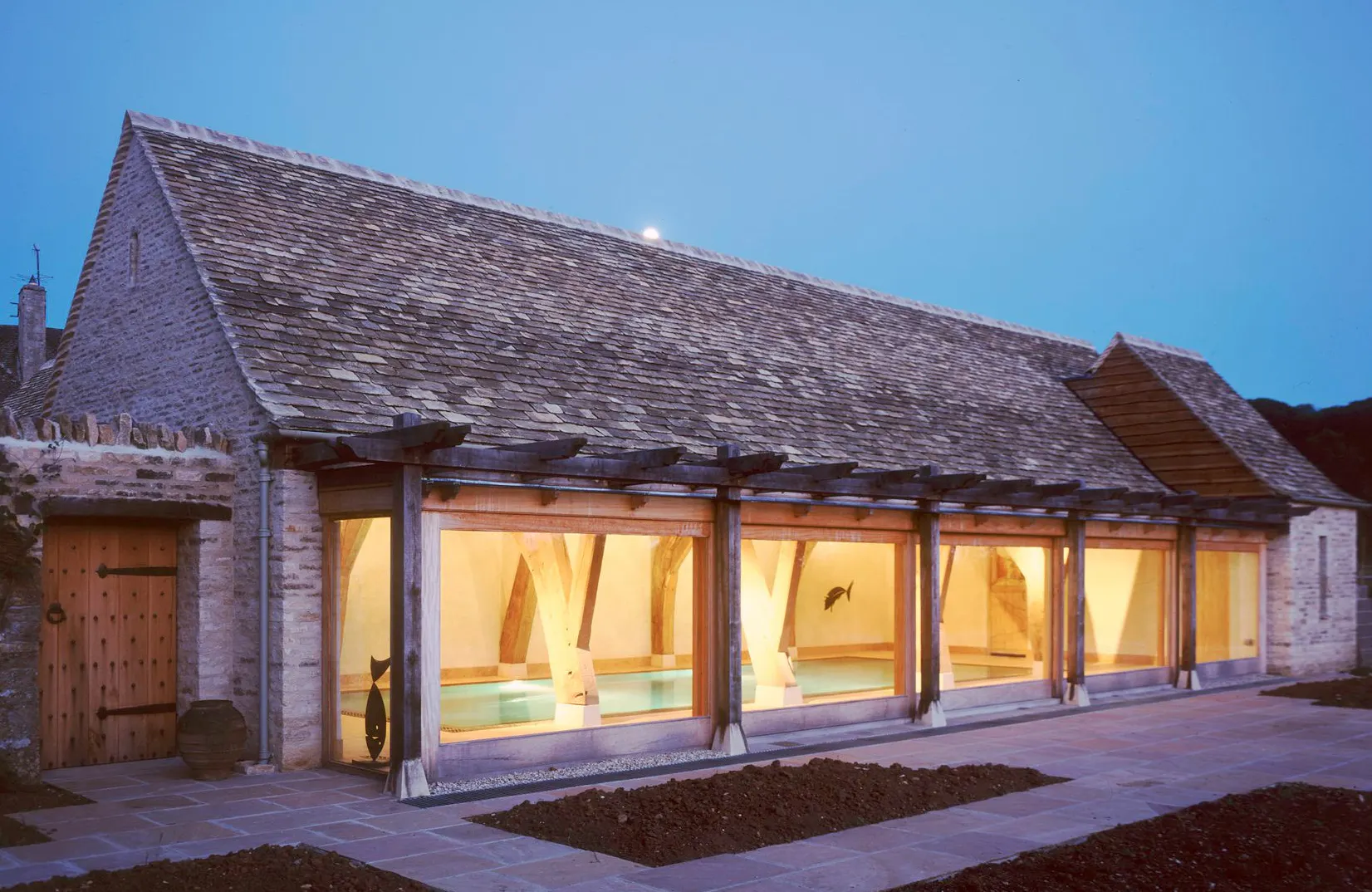 External view of an oak-framed swimming pool