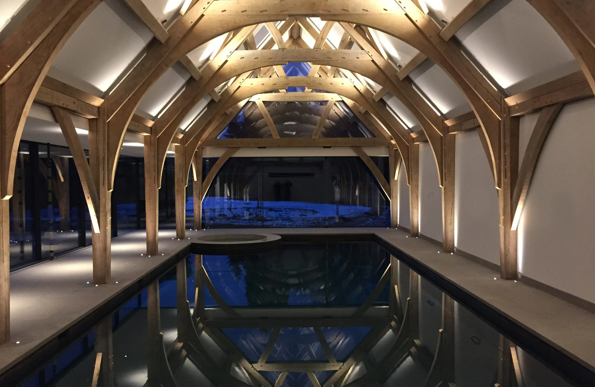 Swimming pool with an oak frame