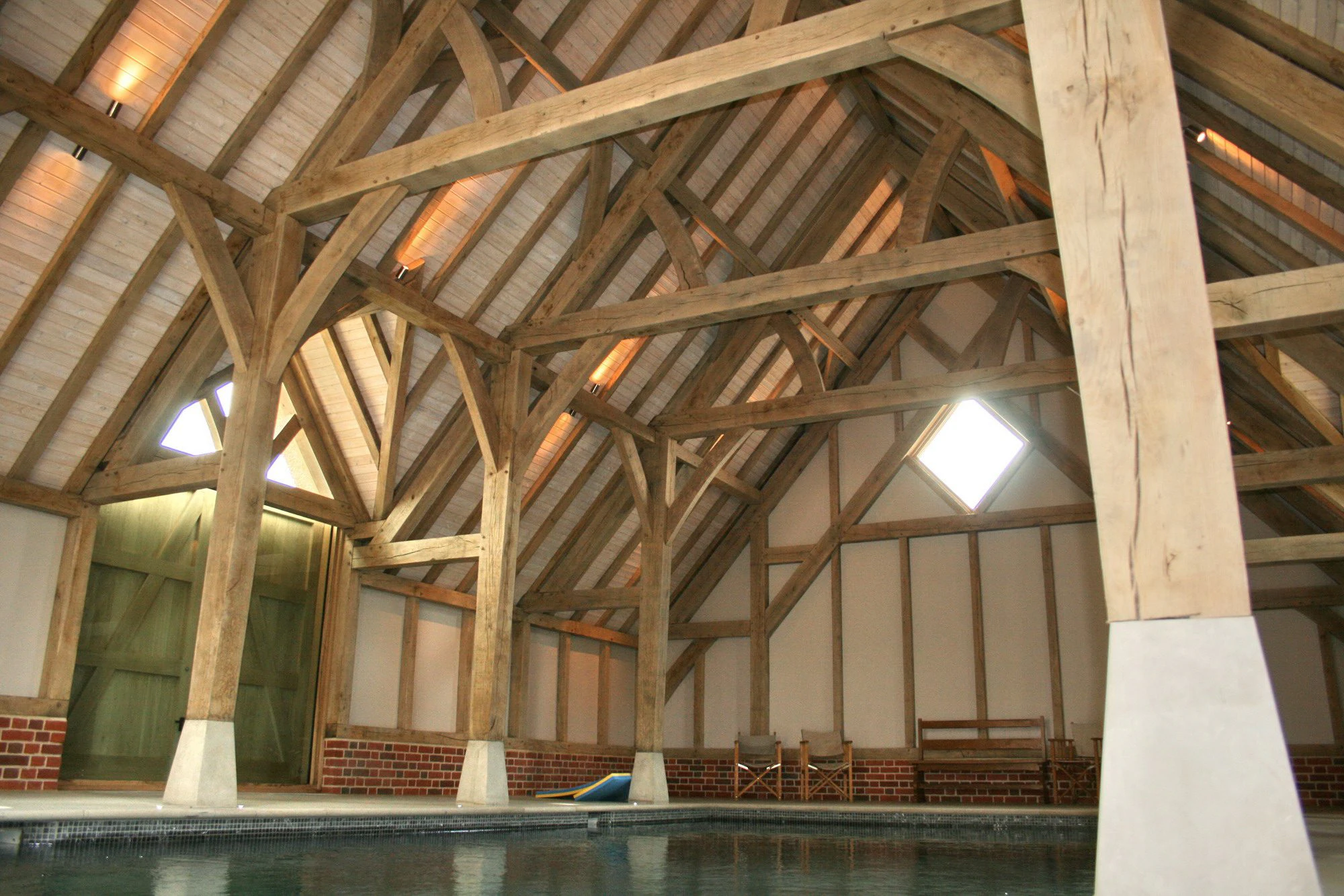 Swimming pool featuring a traditional timber frame