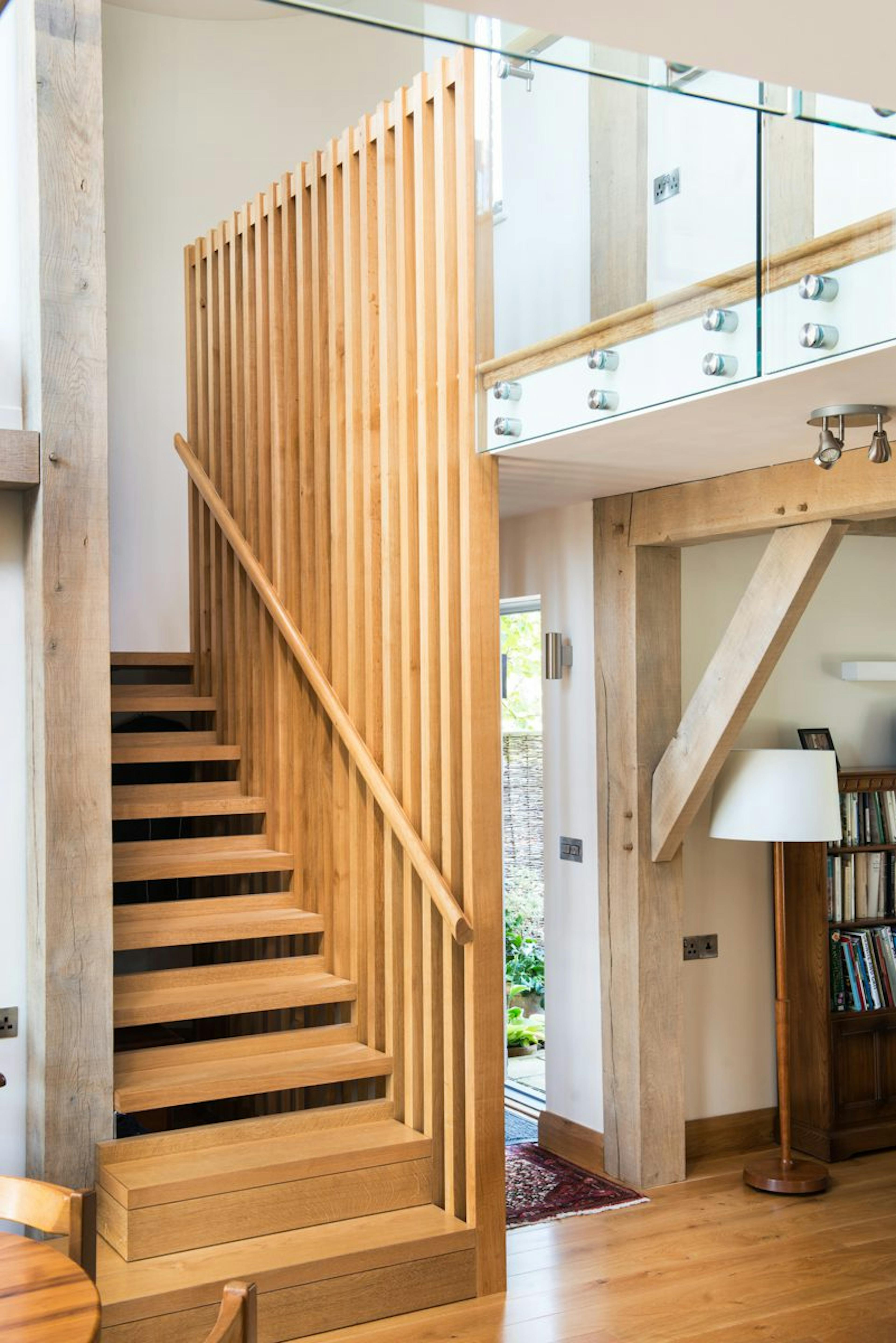 Staircase inside an open-plan oak-framed family home