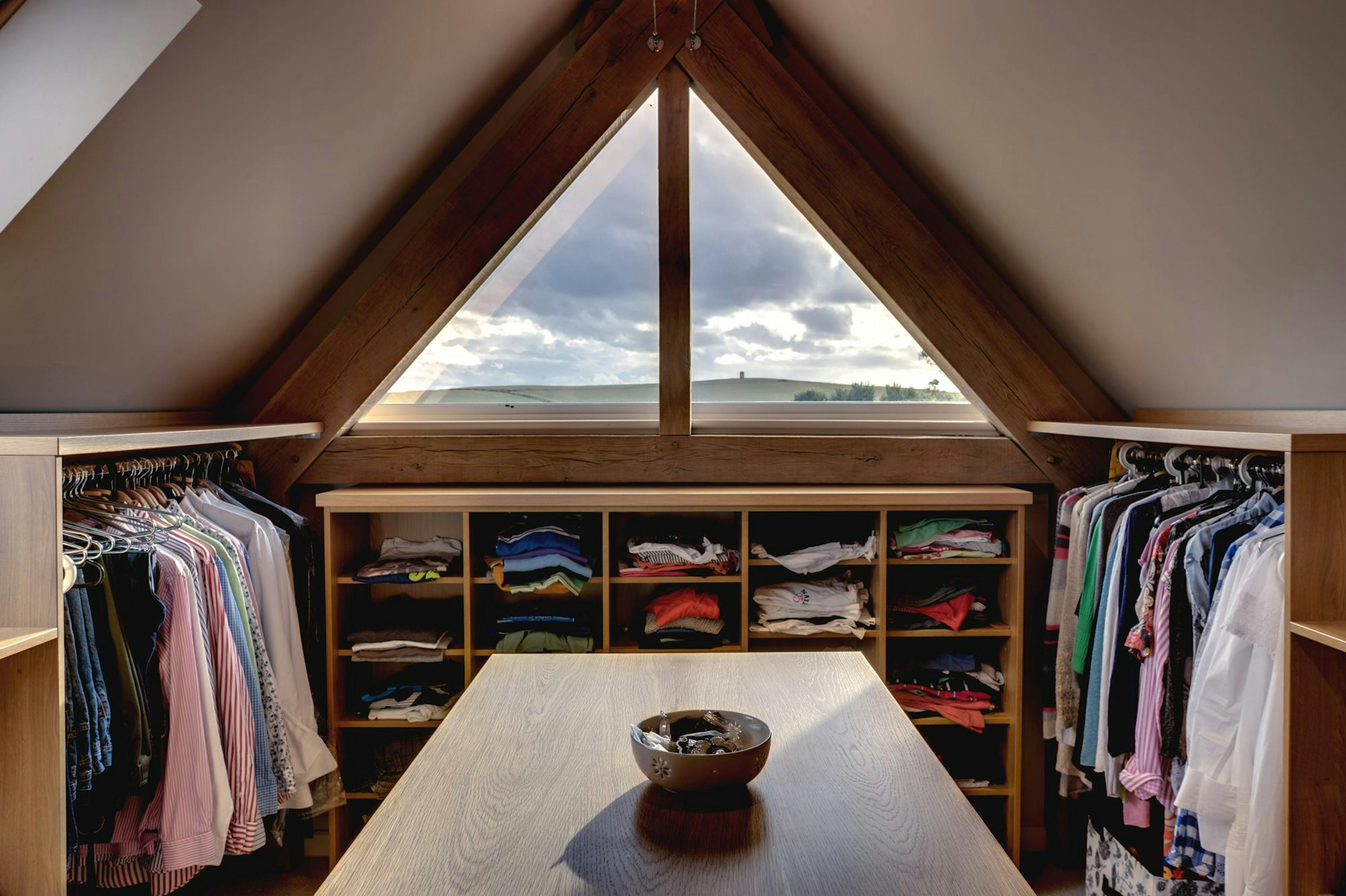 A unique oak-framed apex featuring a fitted walk-in wardrobe, offering panoramic views of the surrounding countryside