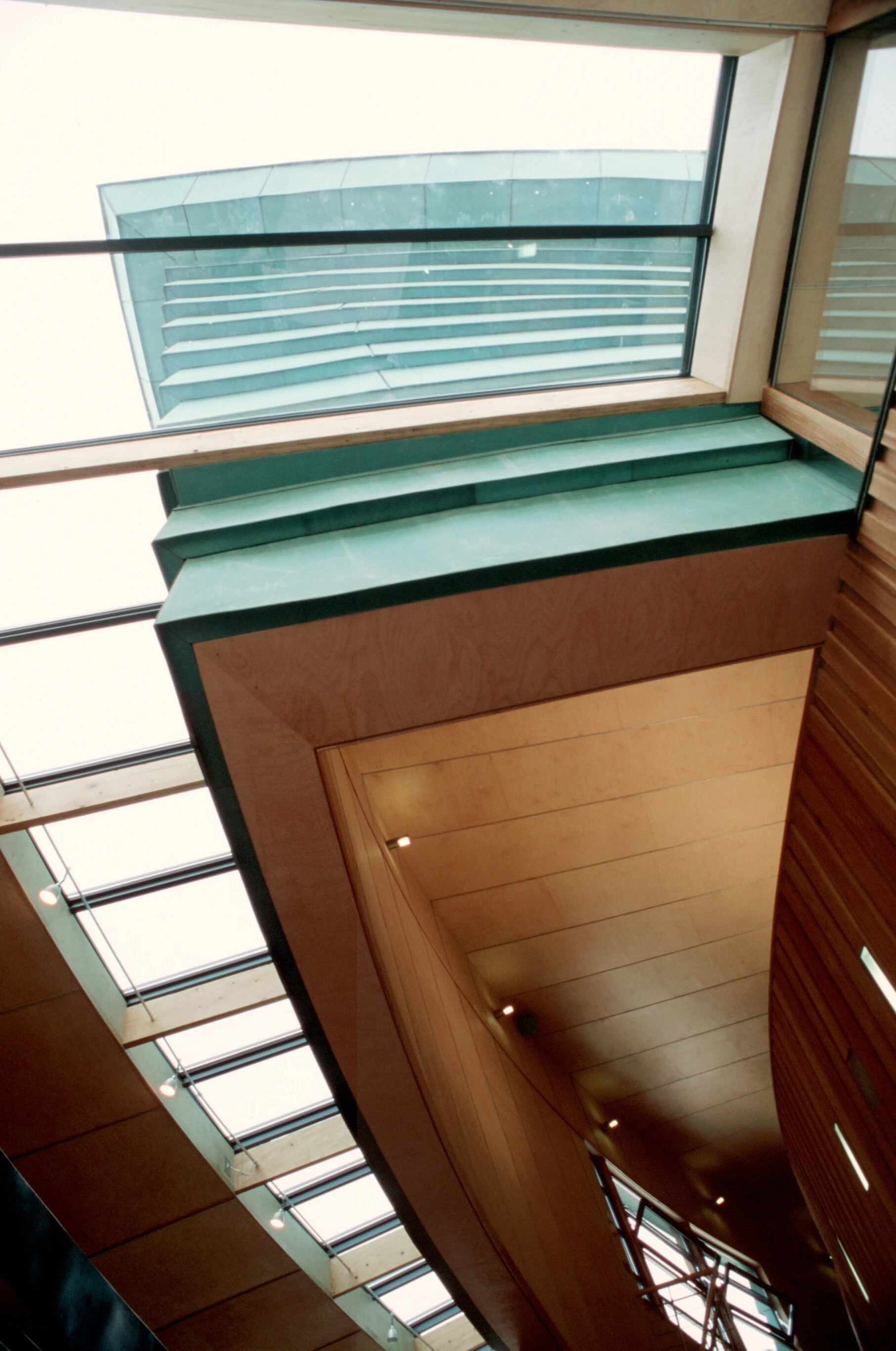 Curved roof lantern inside the Maggie's Centre at Raigmore Hospital in Inverness, providing abundant natural light