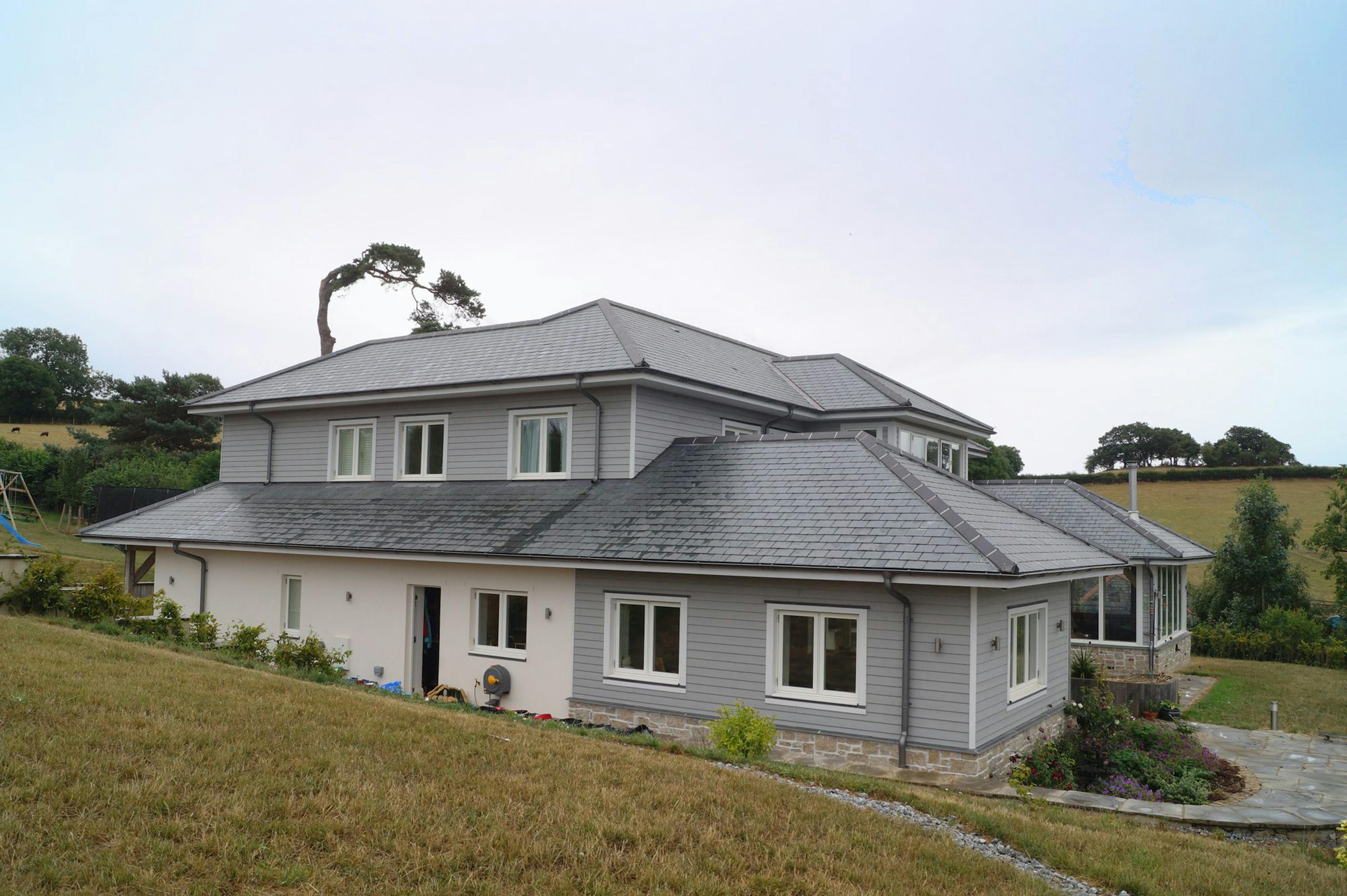 Rear view of a New England-style, two-storey oak-framed home