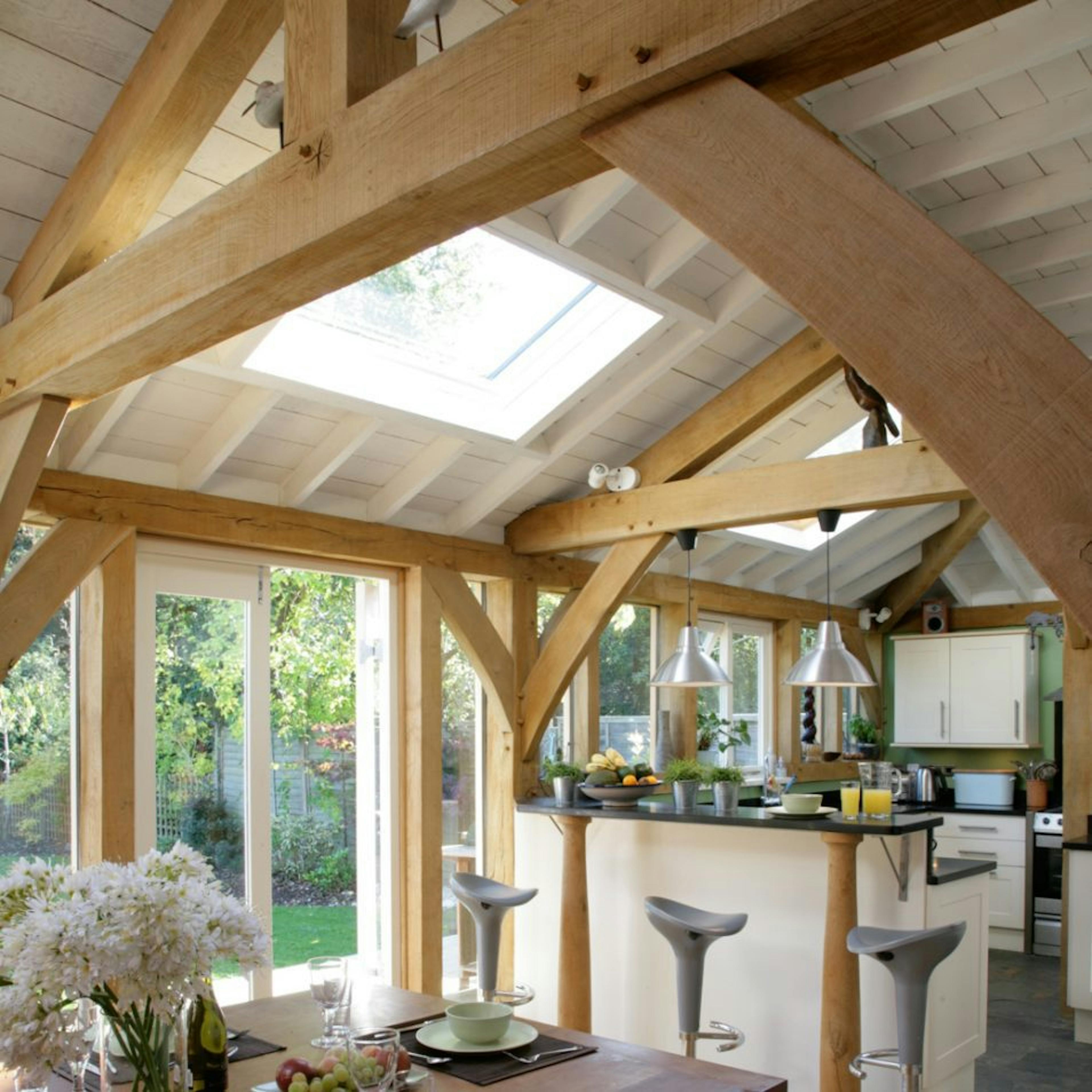 Lean-to extension featuring roof lanterns and softwood paneling
