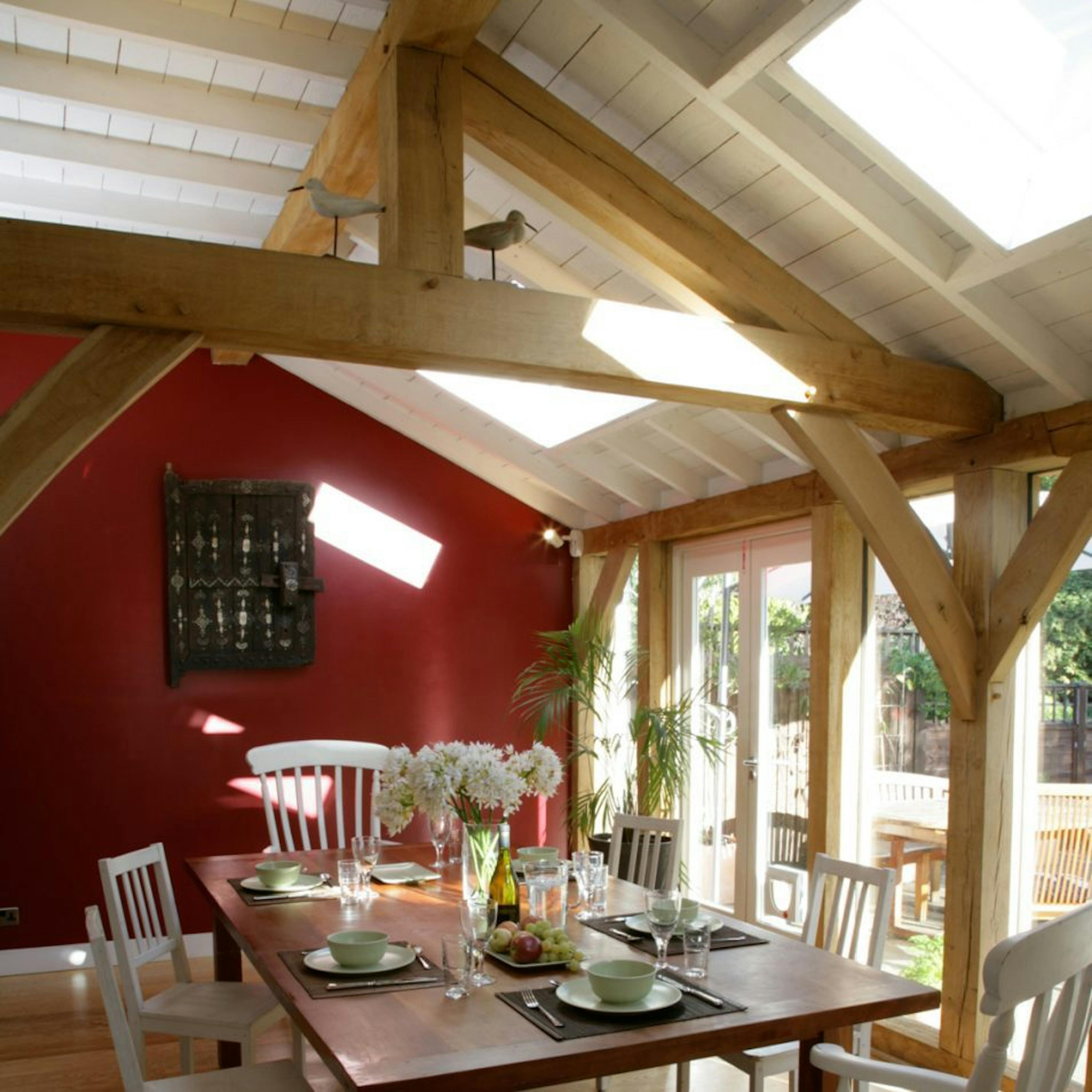 Oak-framed wraparound lean-to extension