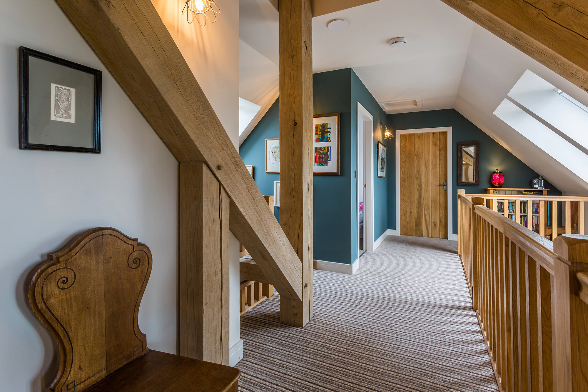 Internal view of the vaulted living space within an oak-framed family home