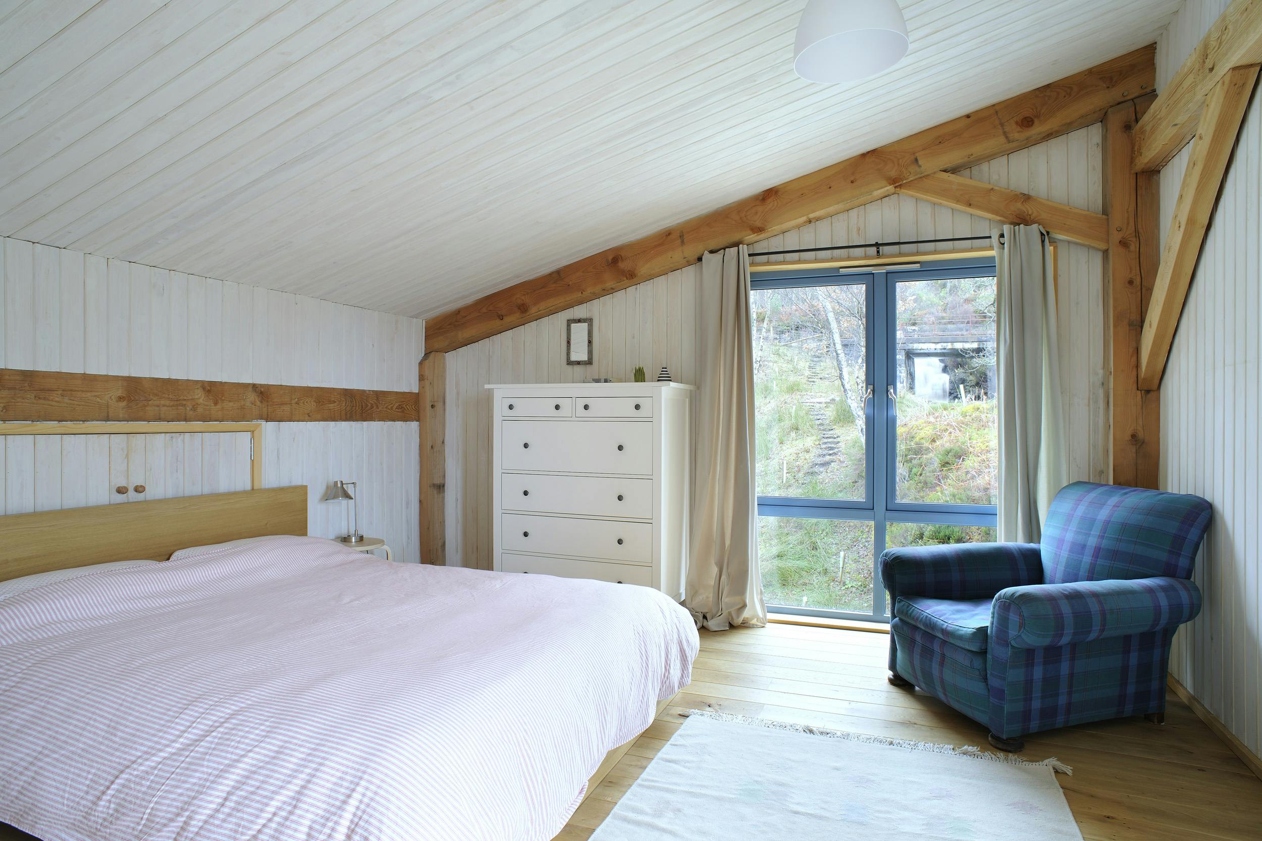 Internal view of a Douglas-fir framed bedroom