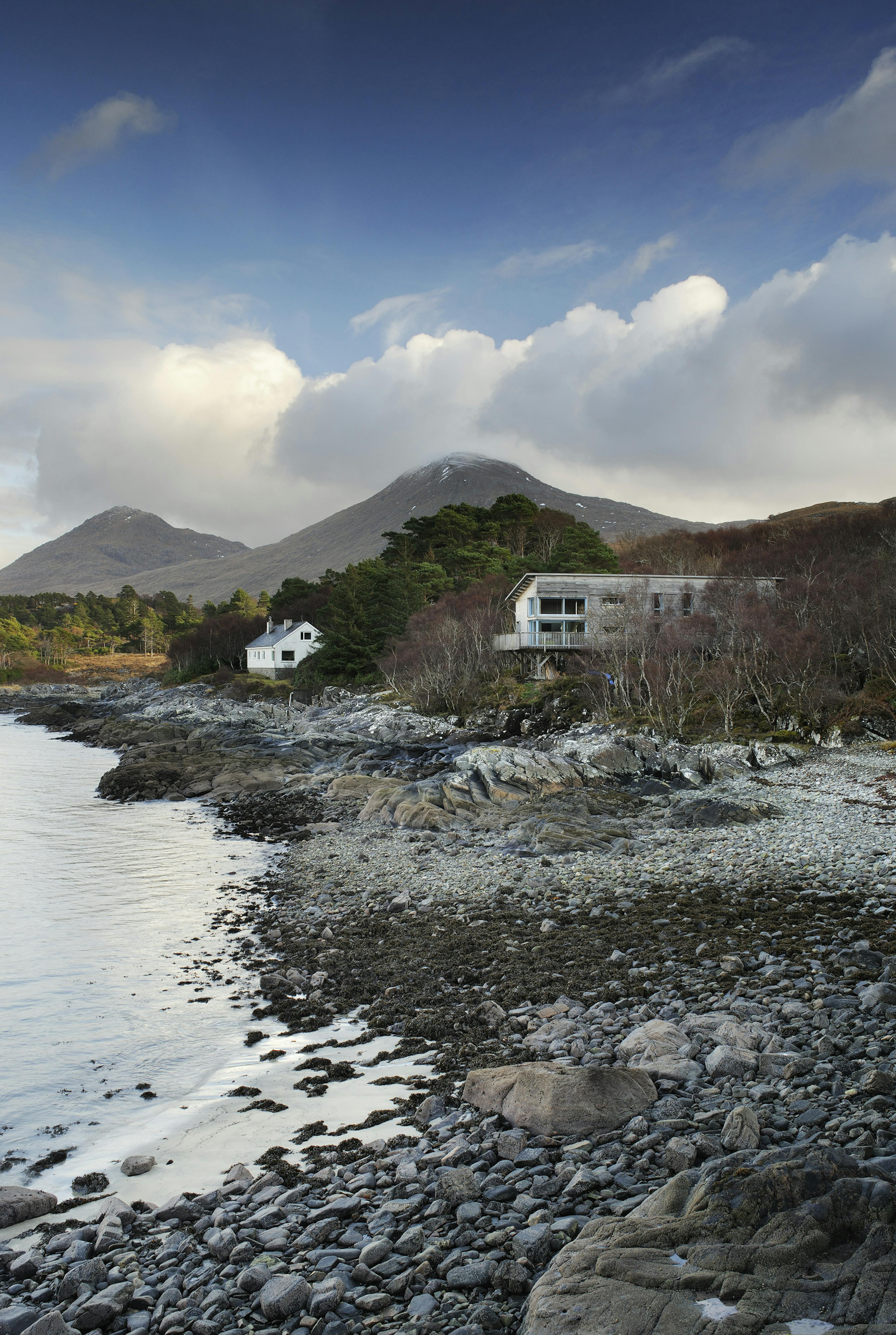 A structural Douglas fir-framed carbon neutral home on the shores of Loch Ailort, blending seamlessly into the surrounding moorland