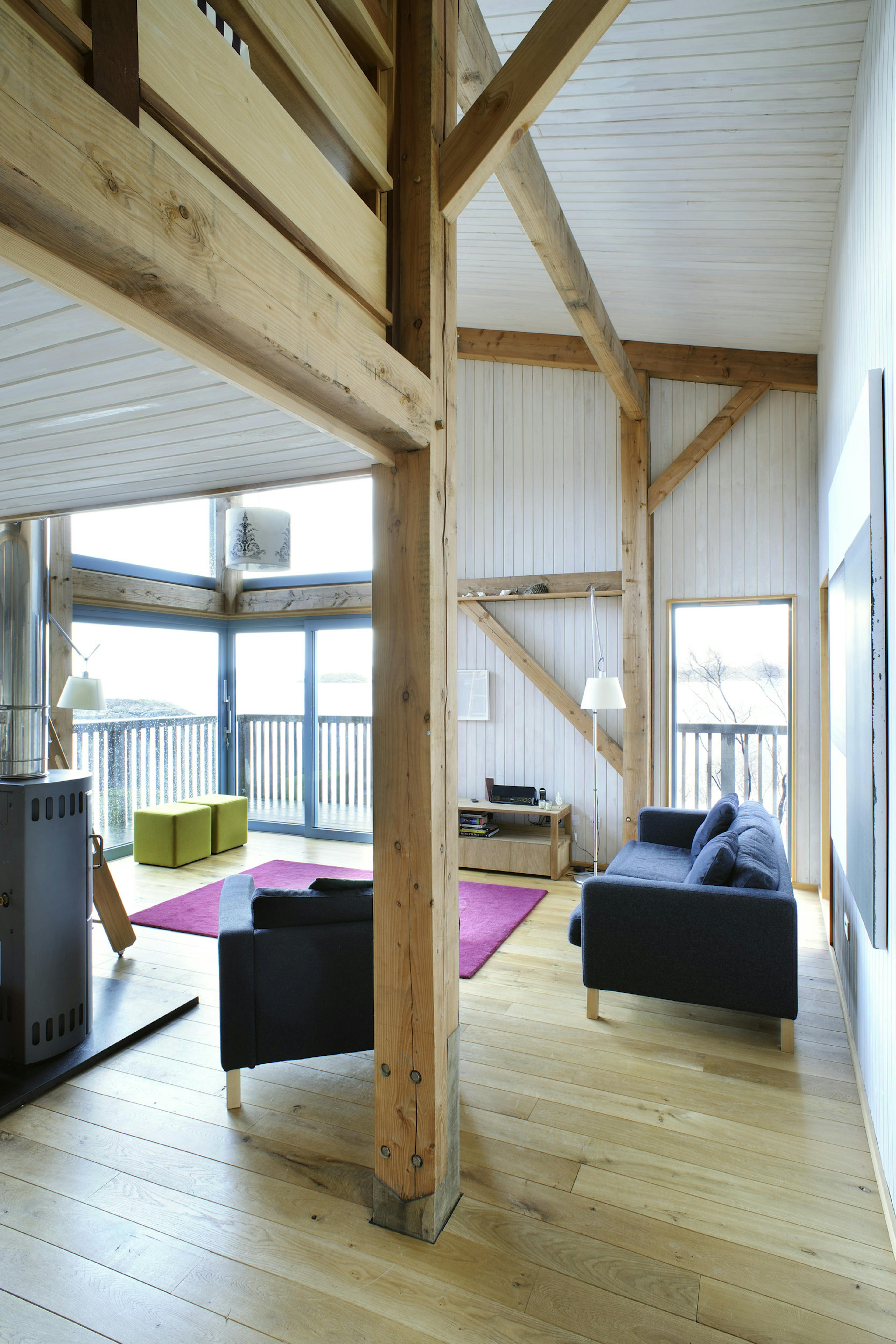 Internal view of a Douglas-fir framed living space with vaulted ceilings