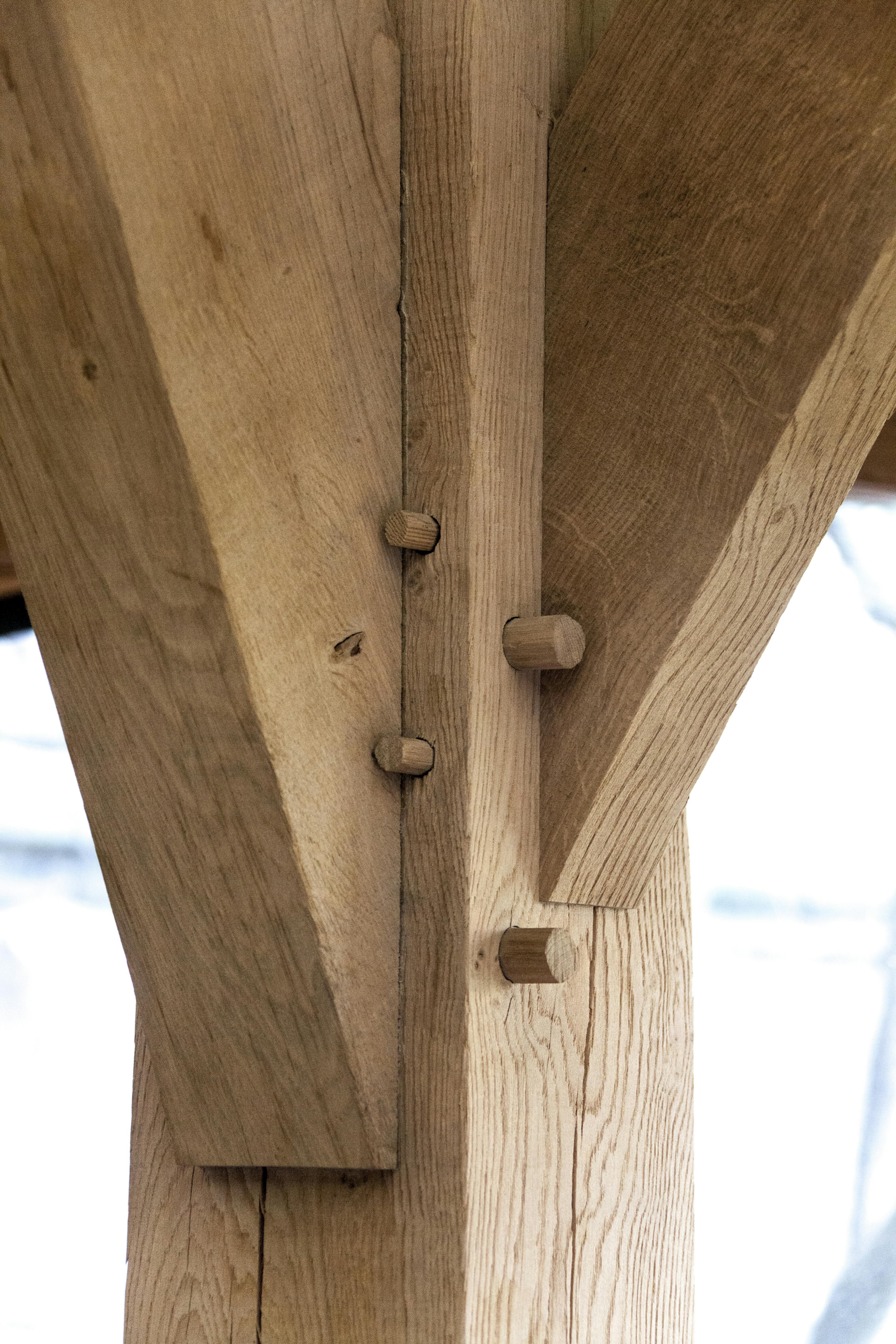 Close-up detail of a tapered oak post
