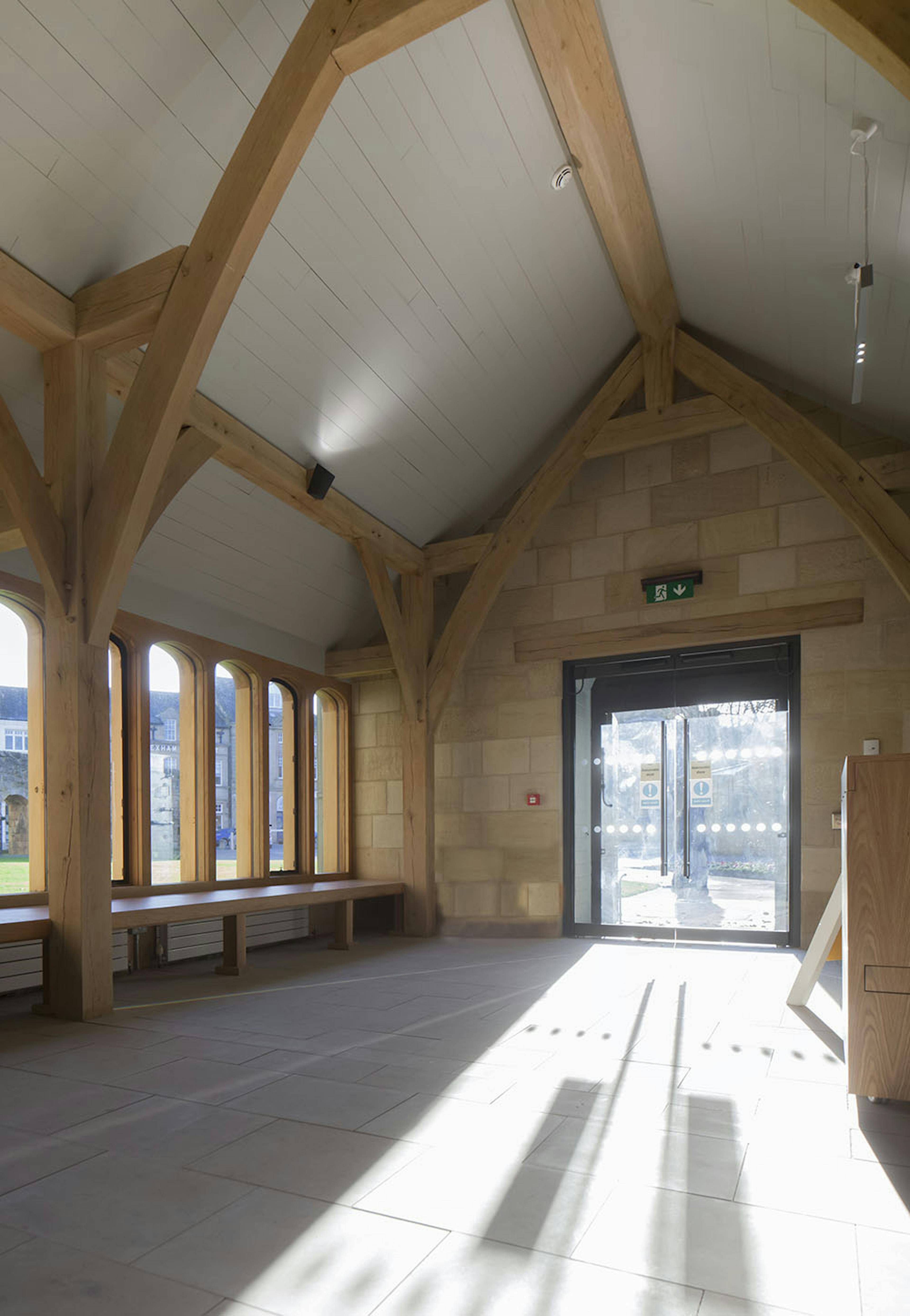 Internal view of the entrance to the oak-framed cloister at Hexham Abbey