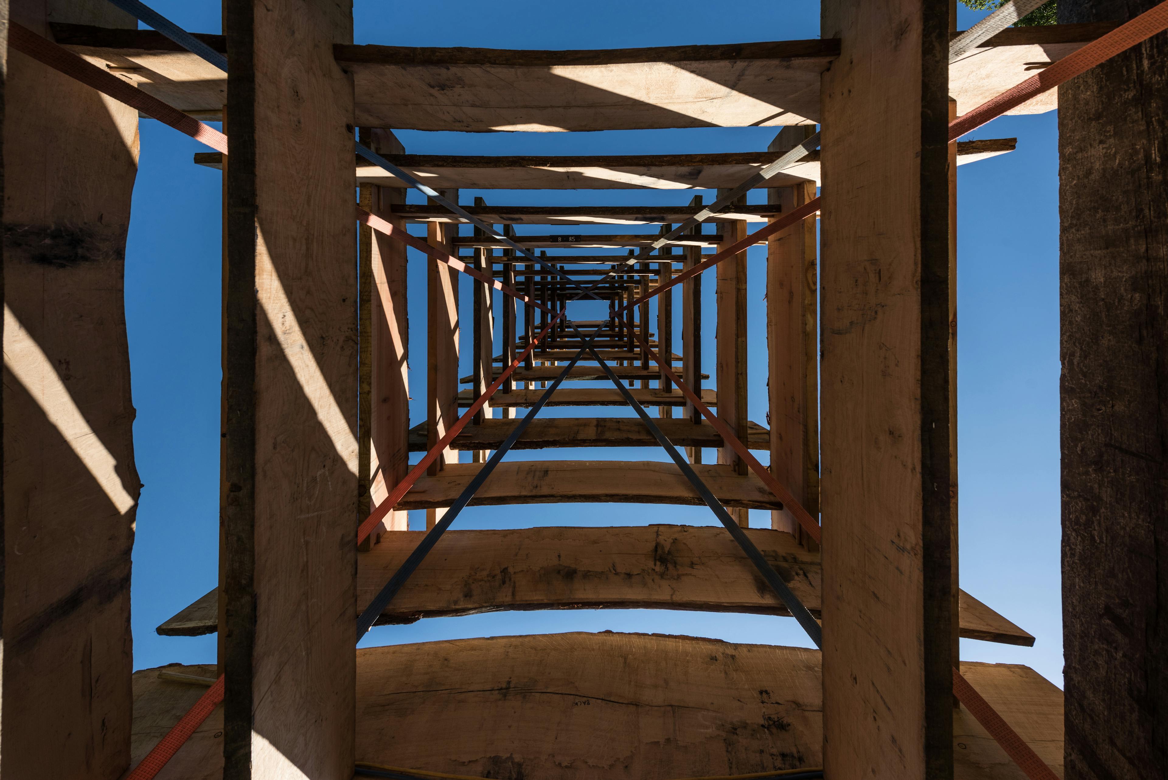 Internal view of an art installation crafted from recycled offcut timber at the Forest of Imagination event