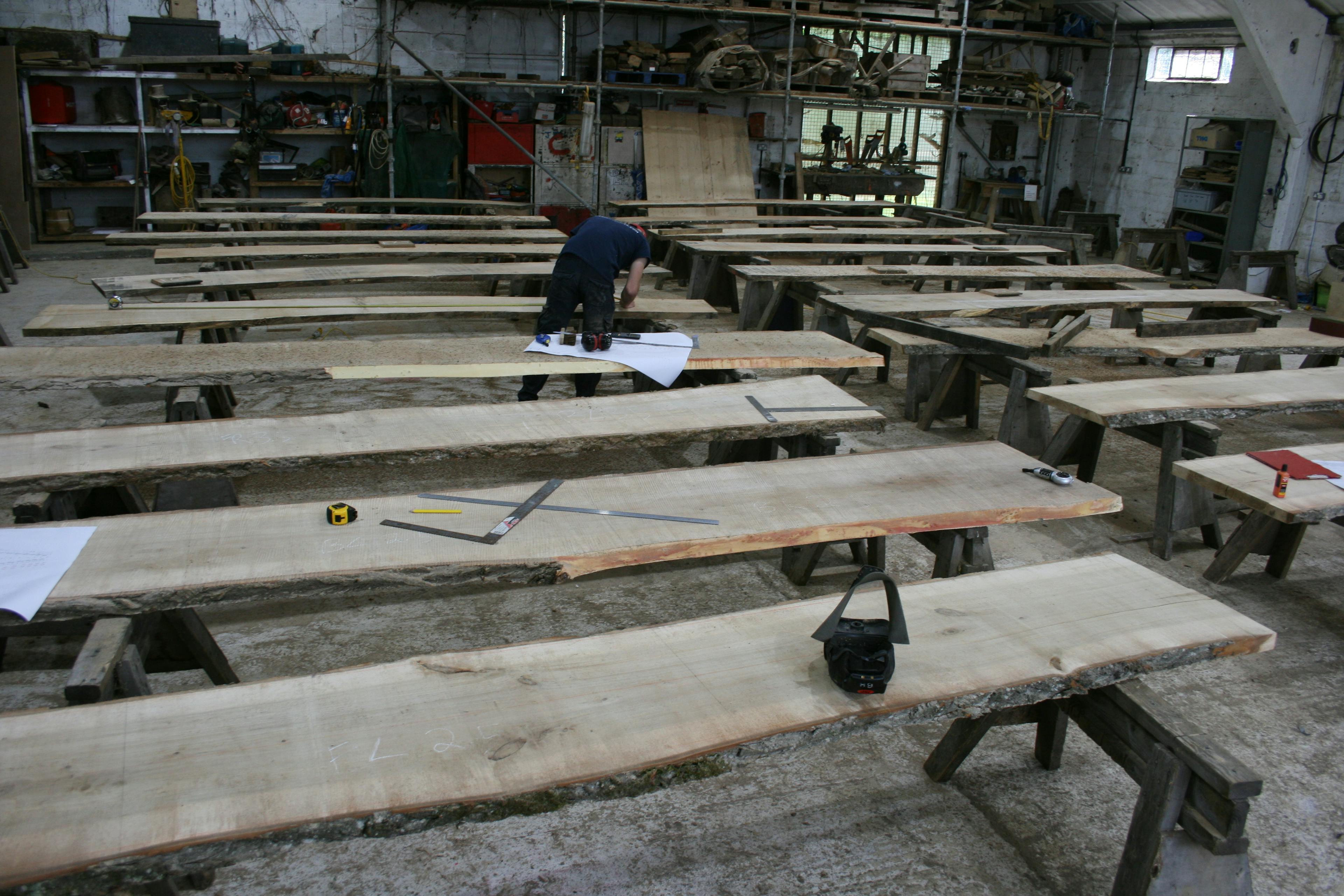 Recycled timber offcuts being prepared in a workshop for an art installation