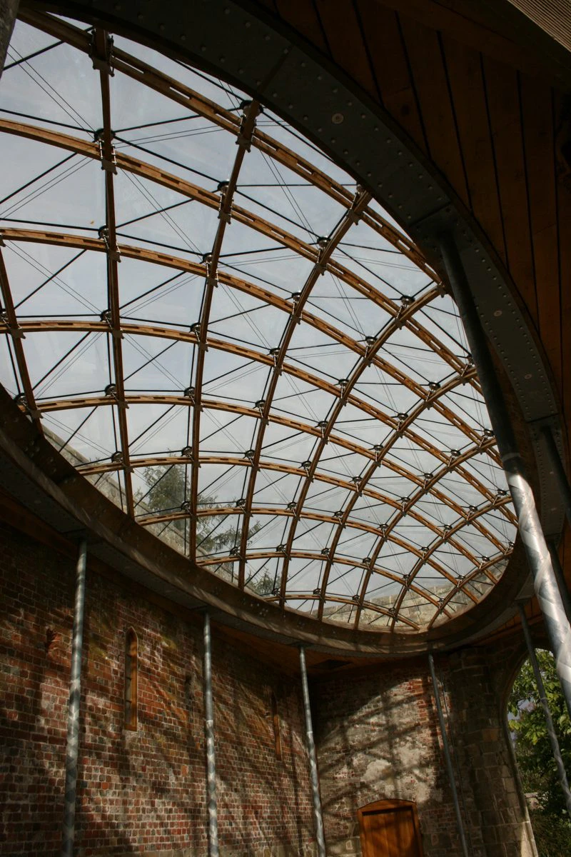 A glazed timber frame gridshell structure designed for a historic orangery at Chiddingstone Castle