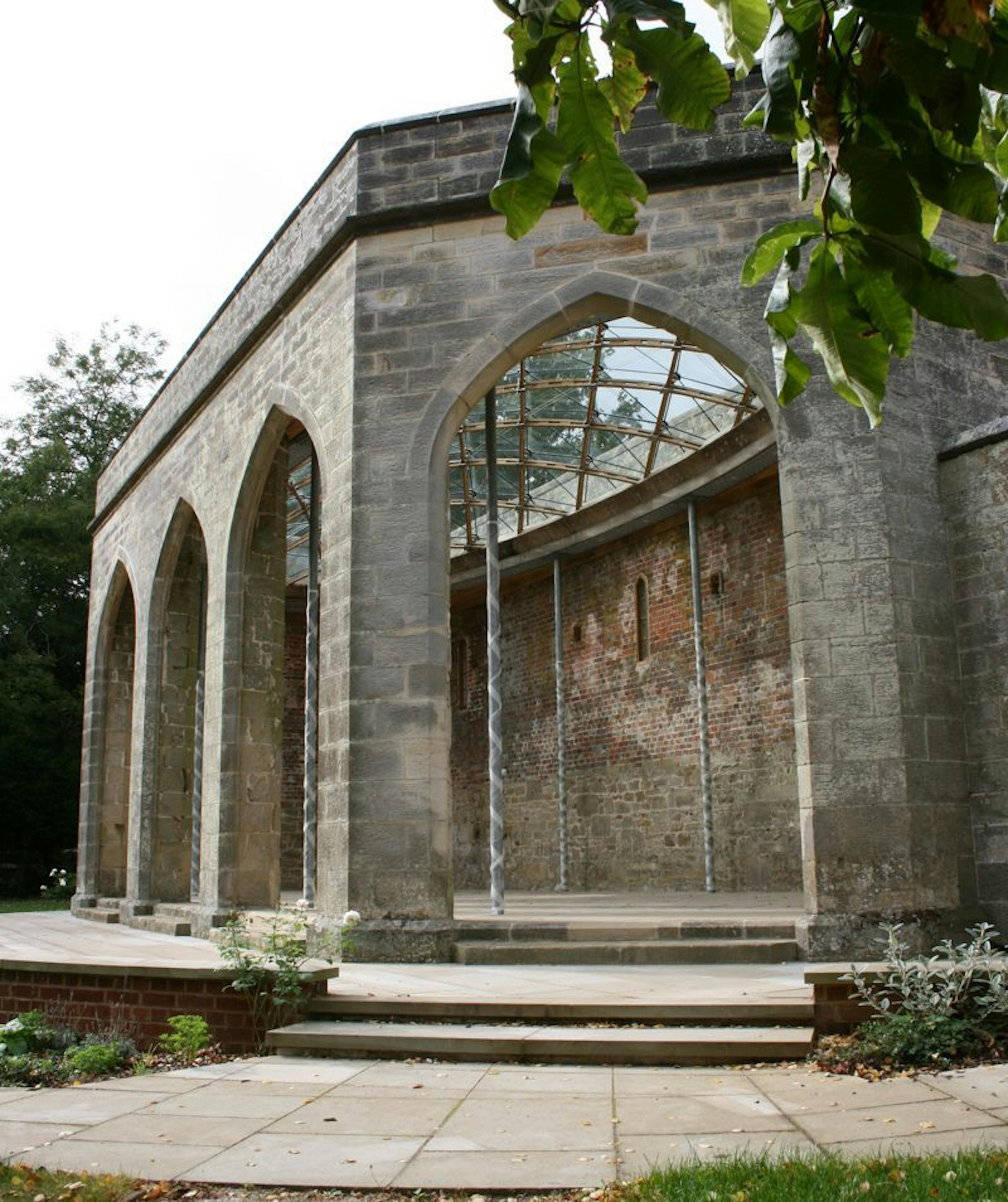 The installation of a glazed timber frame gridshell structure designed for a historic orangery at Chiddingstone Castle, Kent