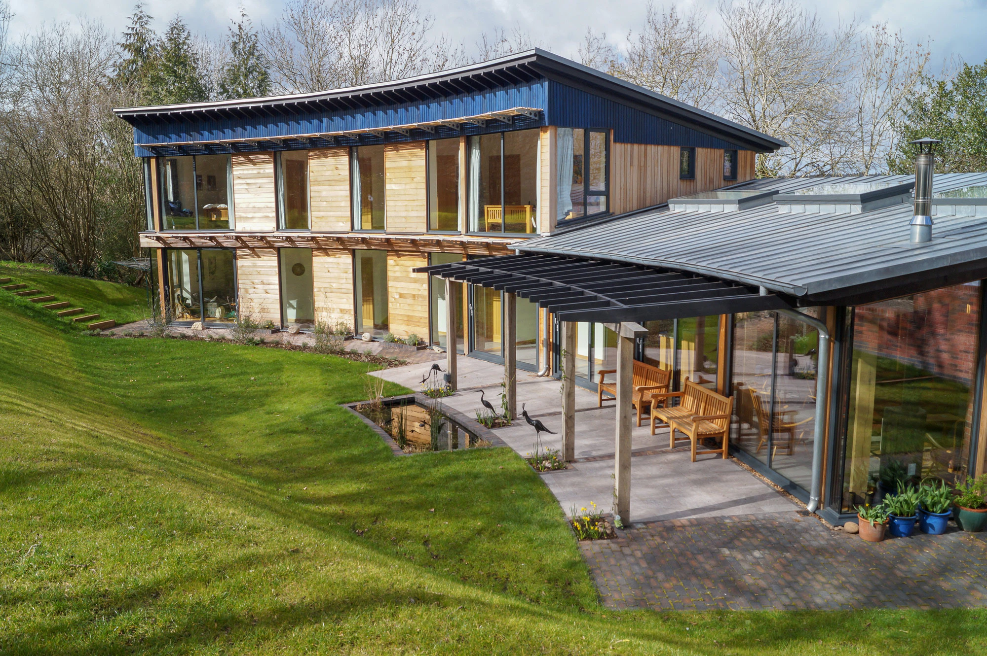 A Curved Carpenter Oak Frame Home with a garden in Worcestershire