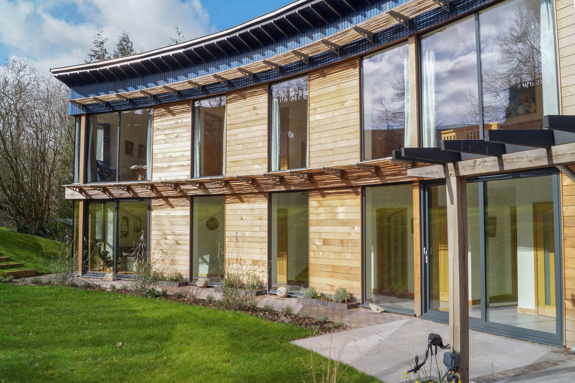 Curved Carpenter Oak Frame Home in Worcestershire showcasing glazed feature