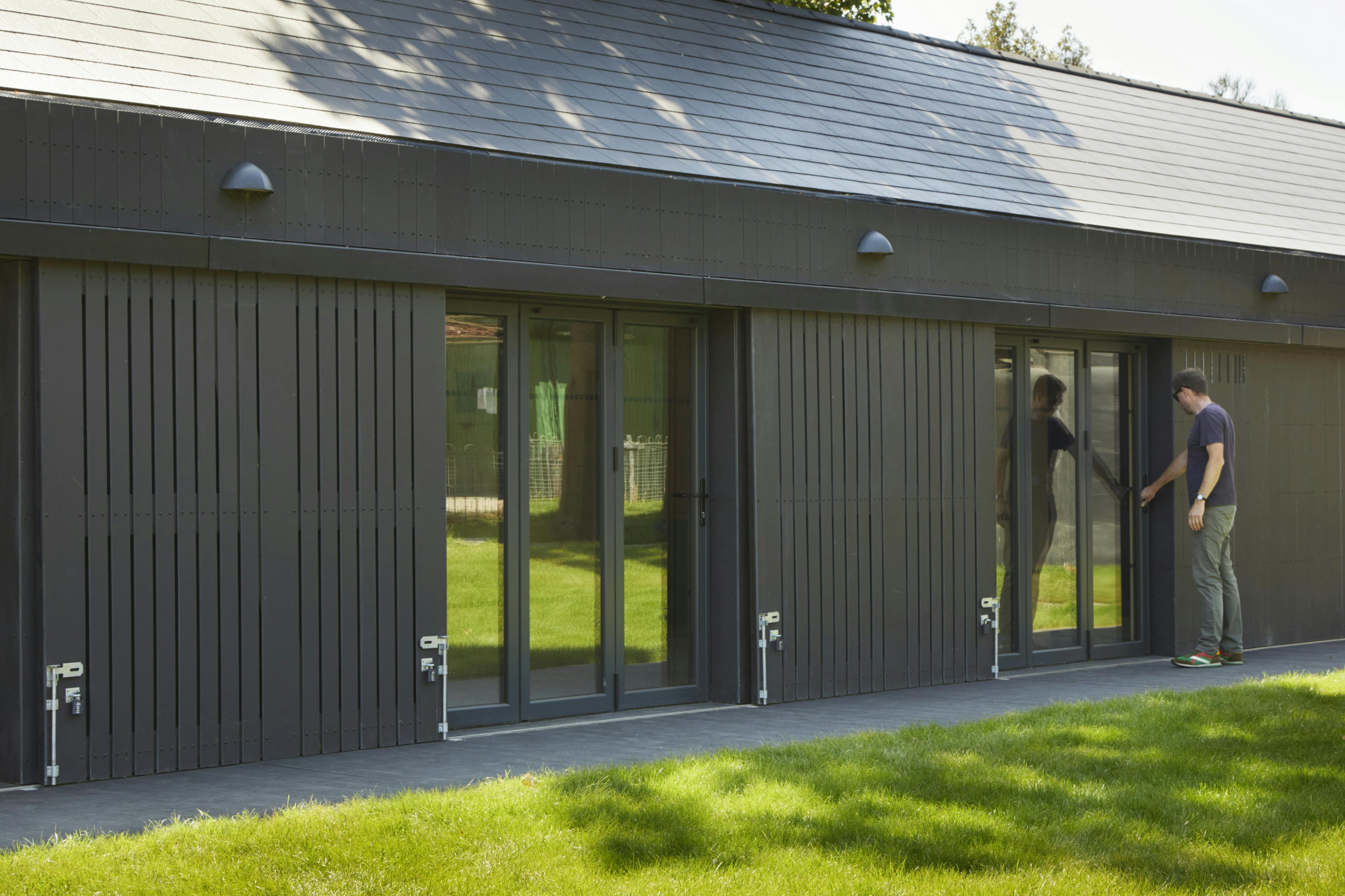 A black clad timber framed community centre