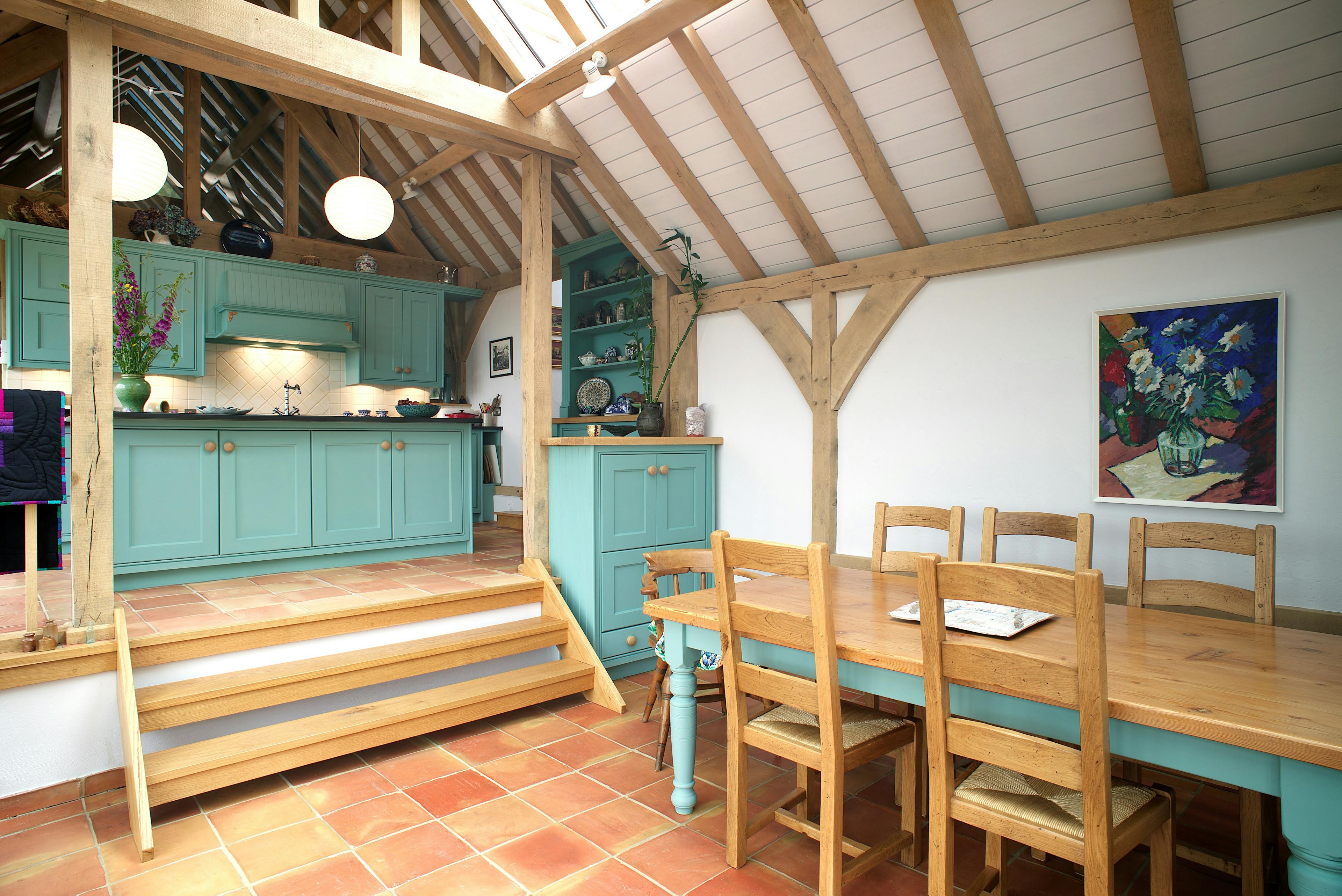 The kitchen and dining room of an oak frame home