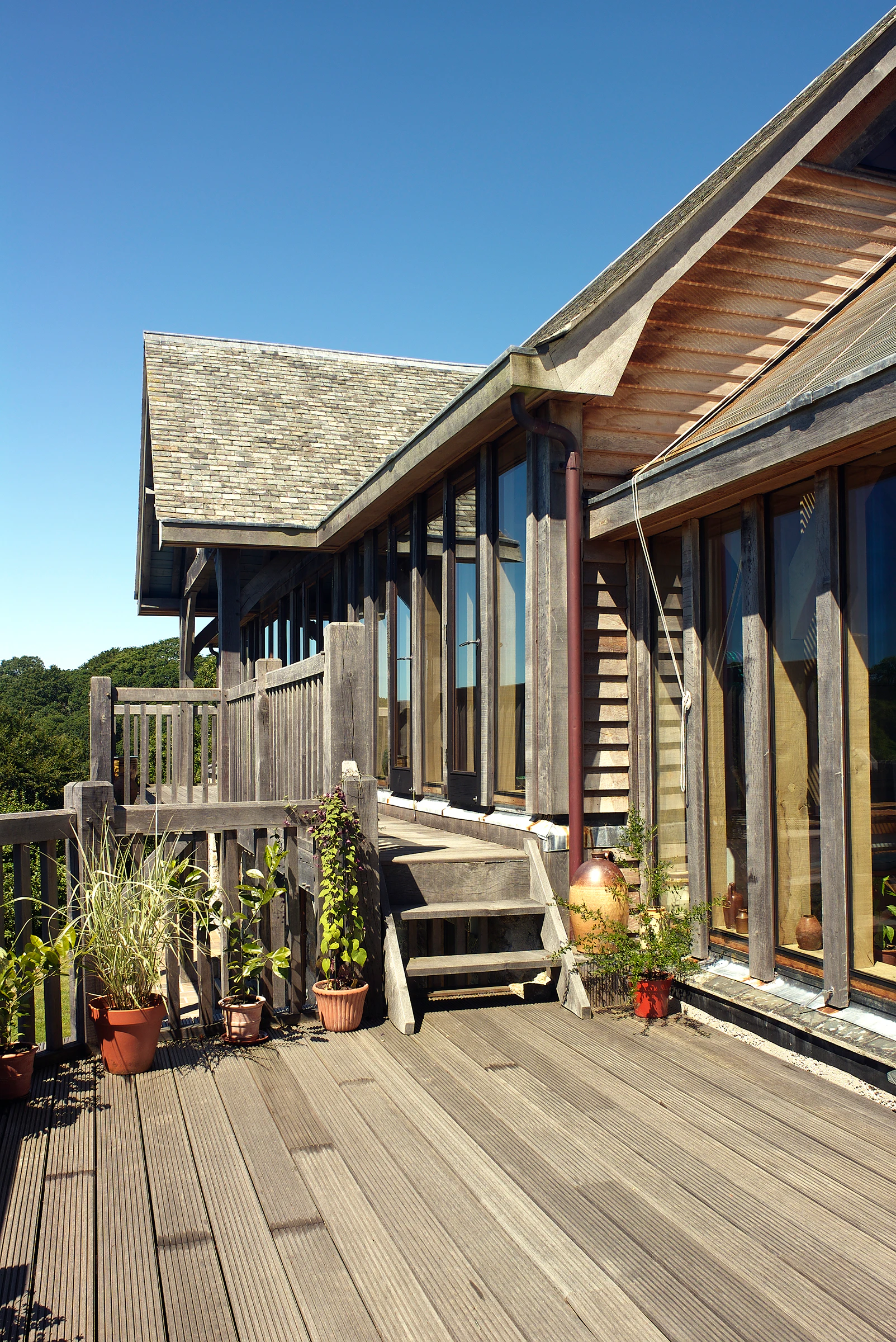Oak frame home with wooden decking veranda