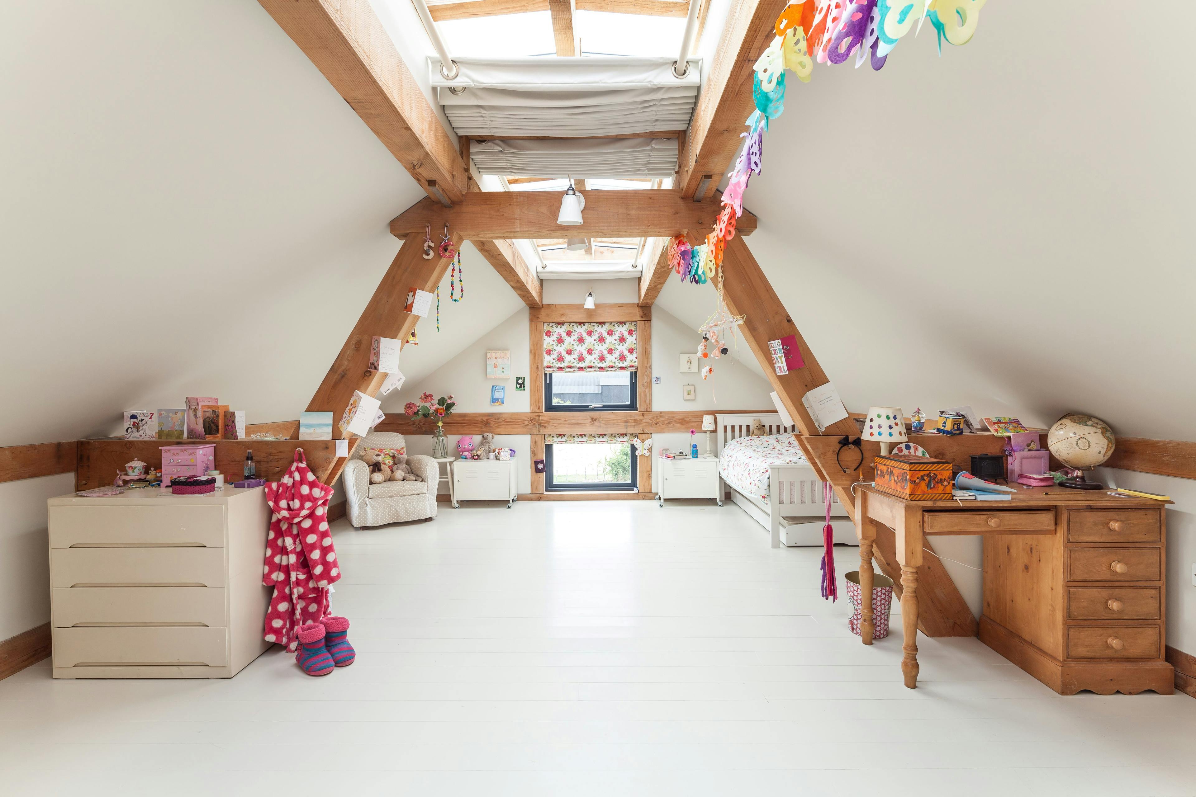 A children's bedroom in a Douglas fir framed family farmhouse with a roof lantern