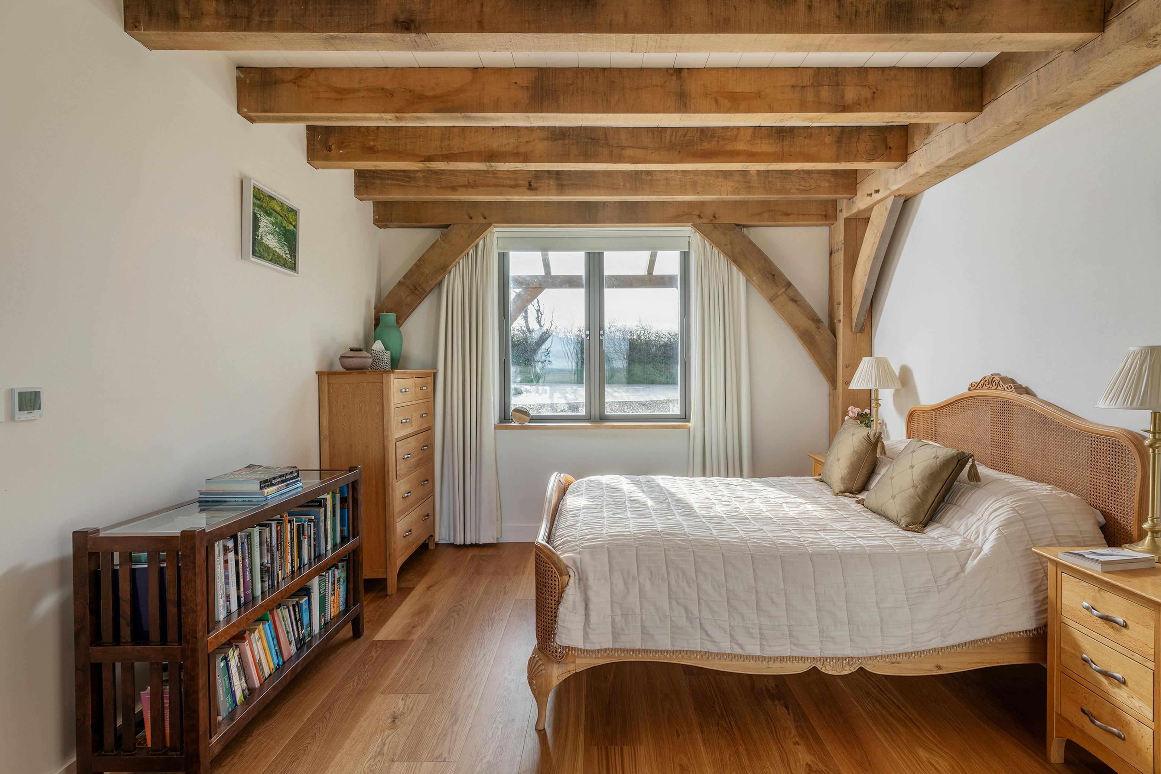 A bedroom in an oak frame home