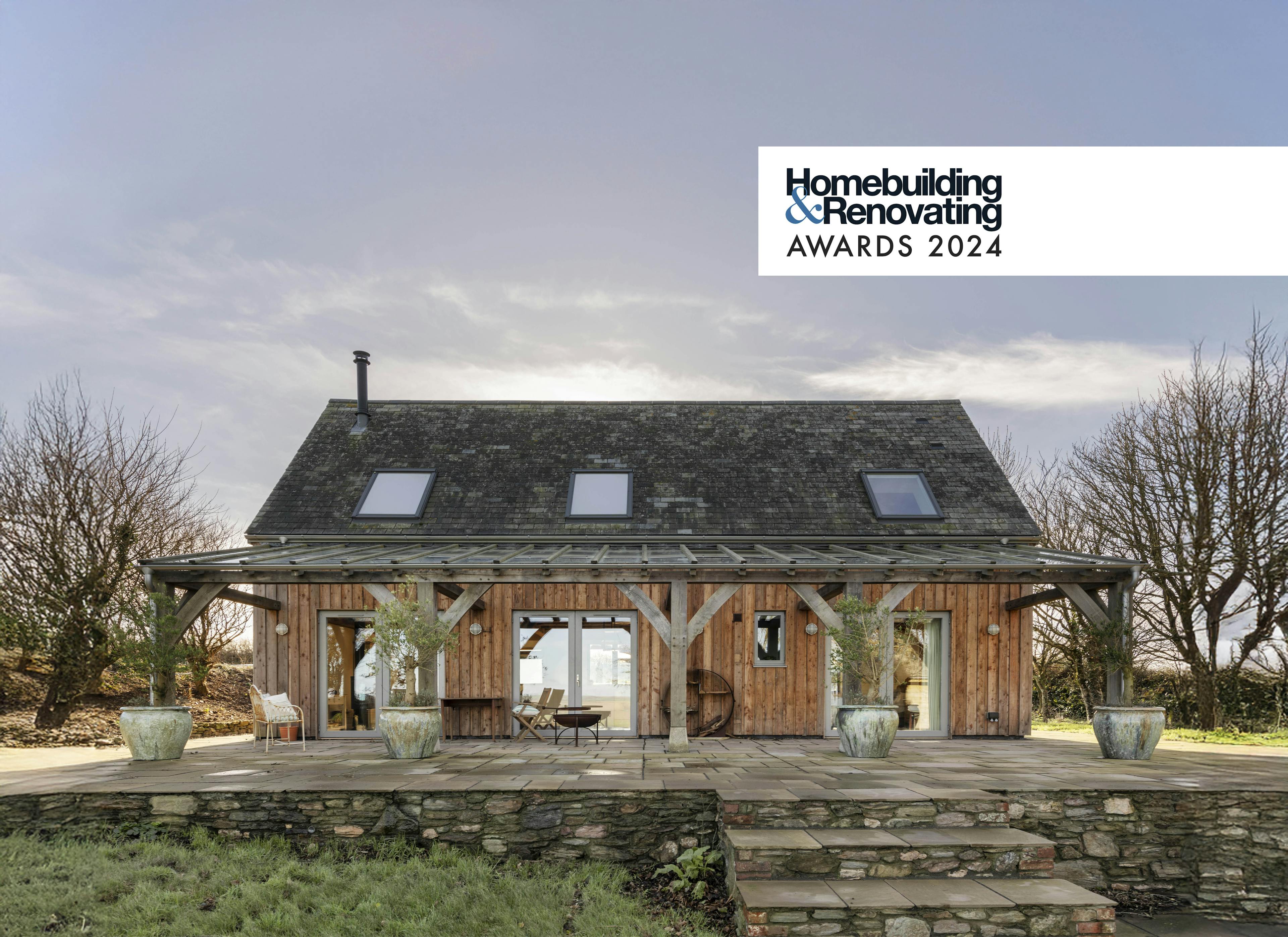 An award winning timber clad oak frame  with oak frame veranda and patio