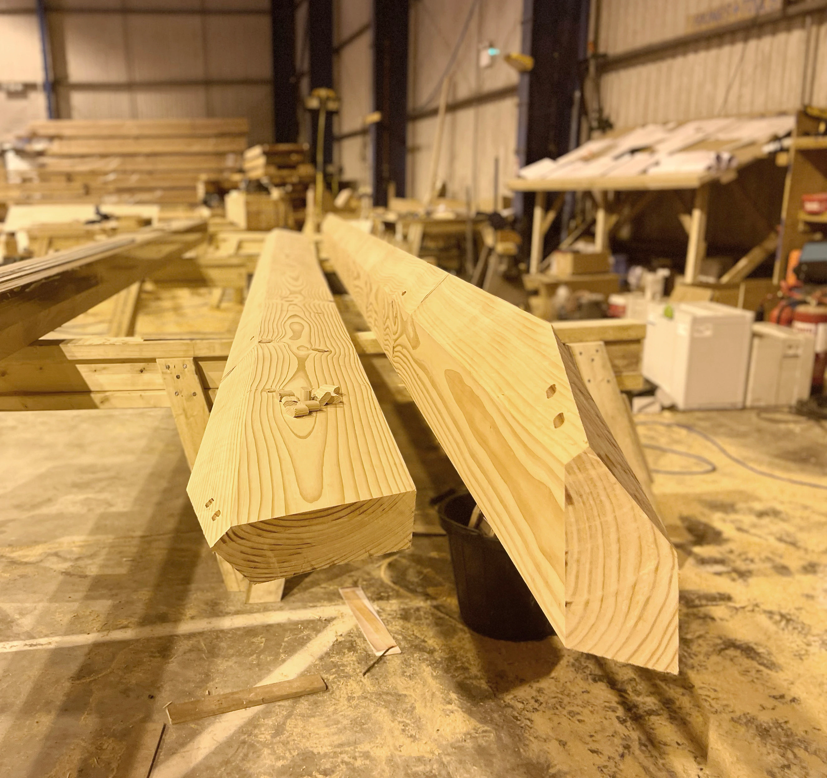 A larch glulam frame in a workshop