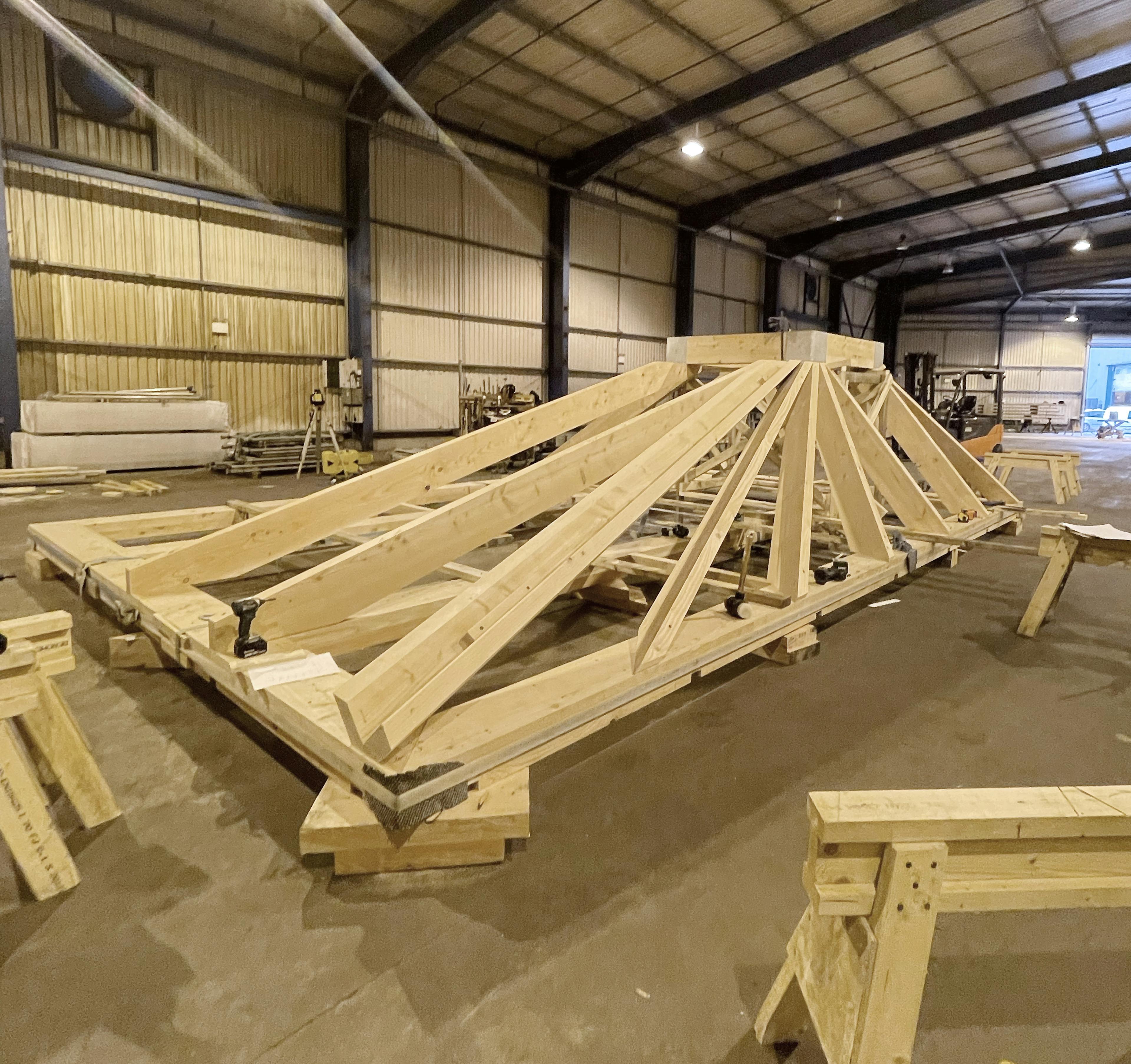 A larch glulam frame in a workshop