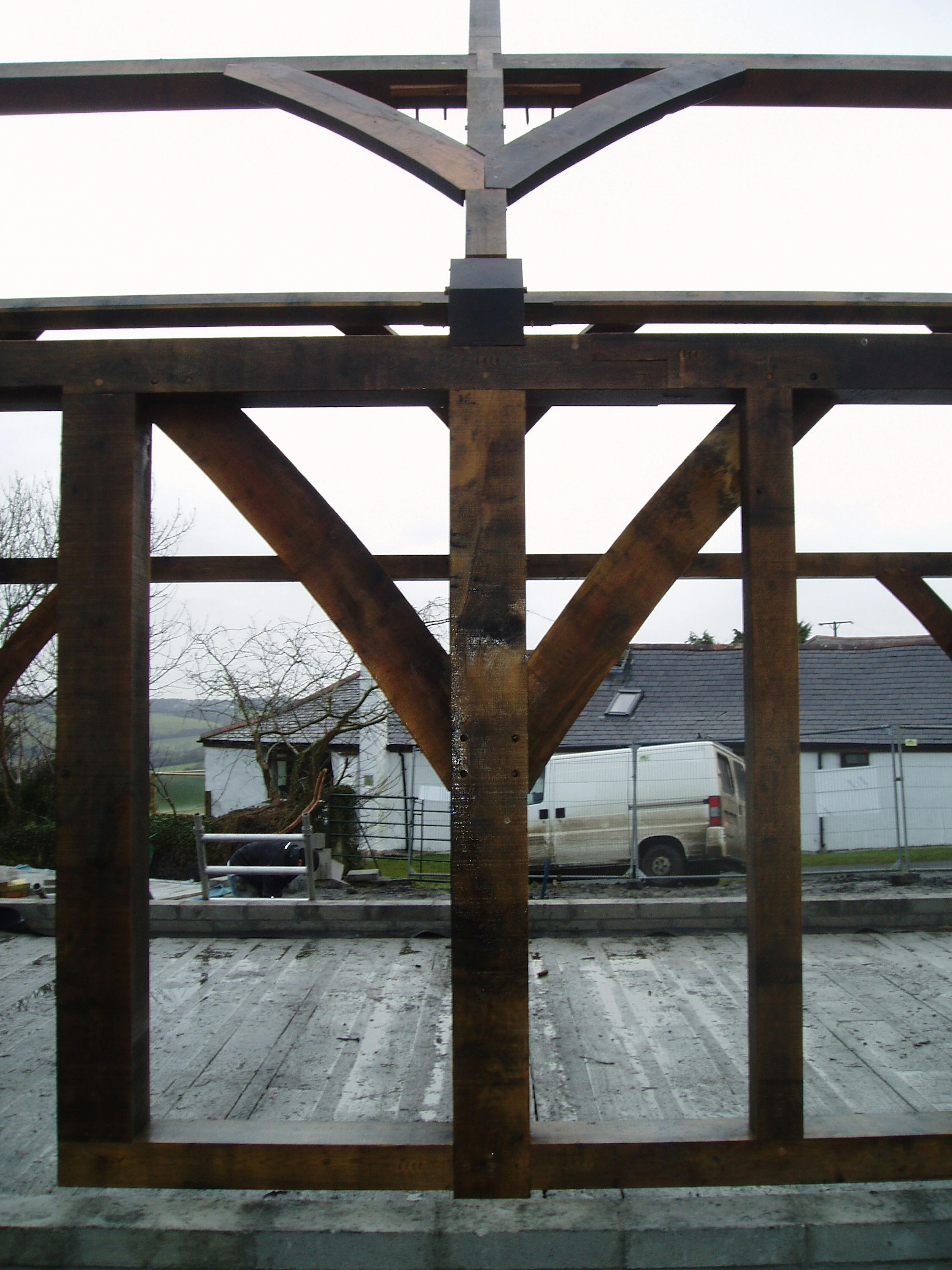 Oak-framed wall brace installation for a single-storey home