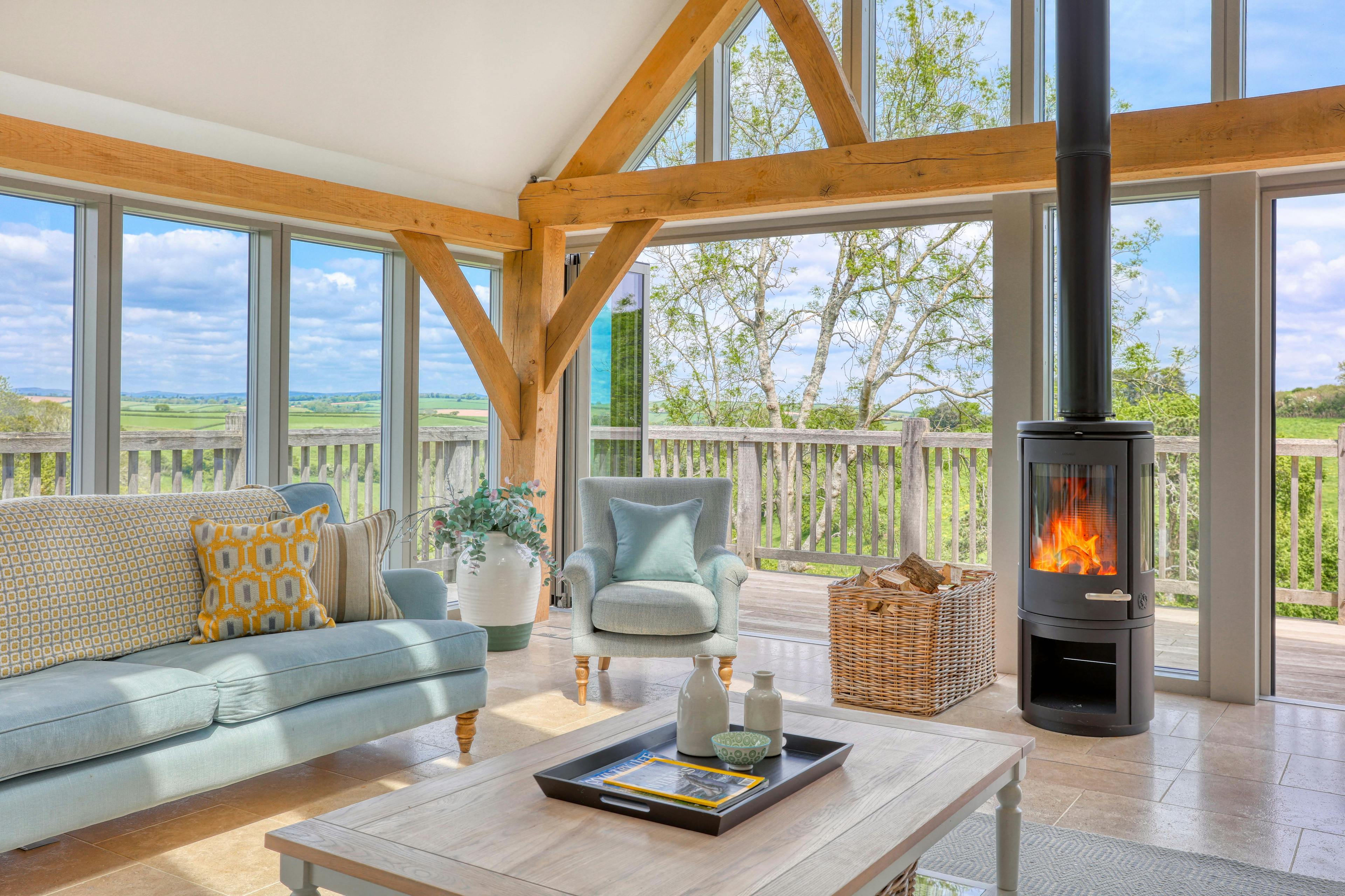 Contemporary oak-framed country home with a joinery screen glazed gable end