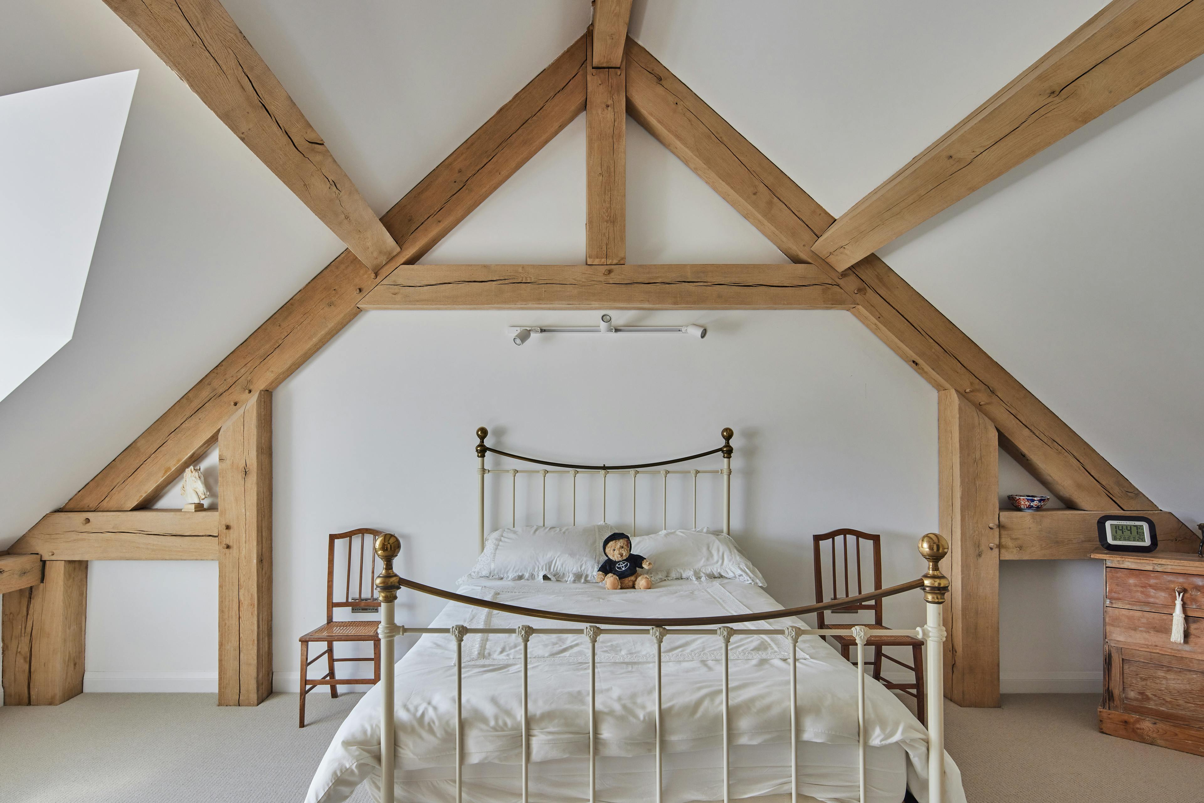 An oak framed bedroom in the eaves