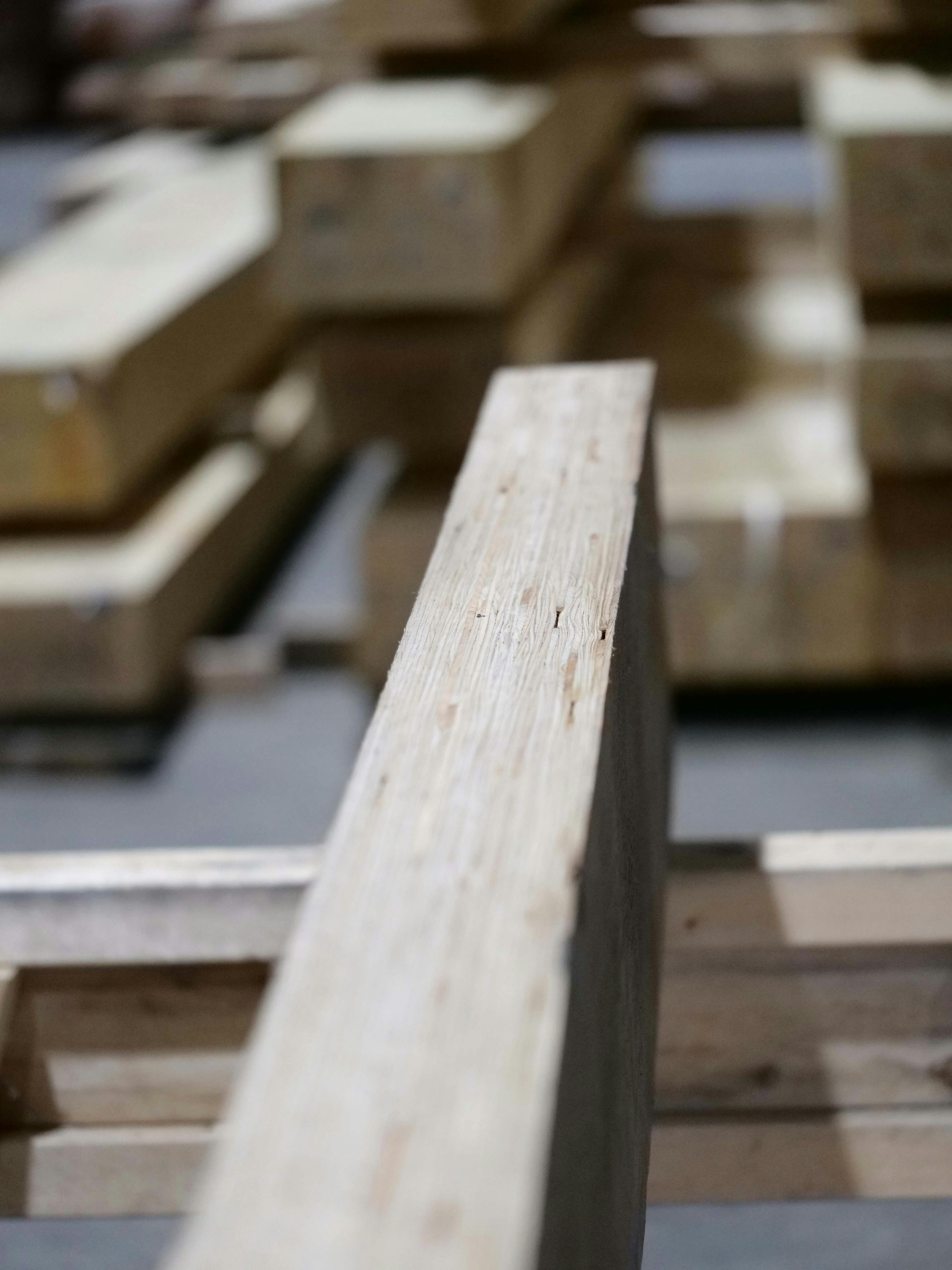 Close-up detail of LVL (Laminated Veneer Lumber) showcasing its layered structure and grain pattern