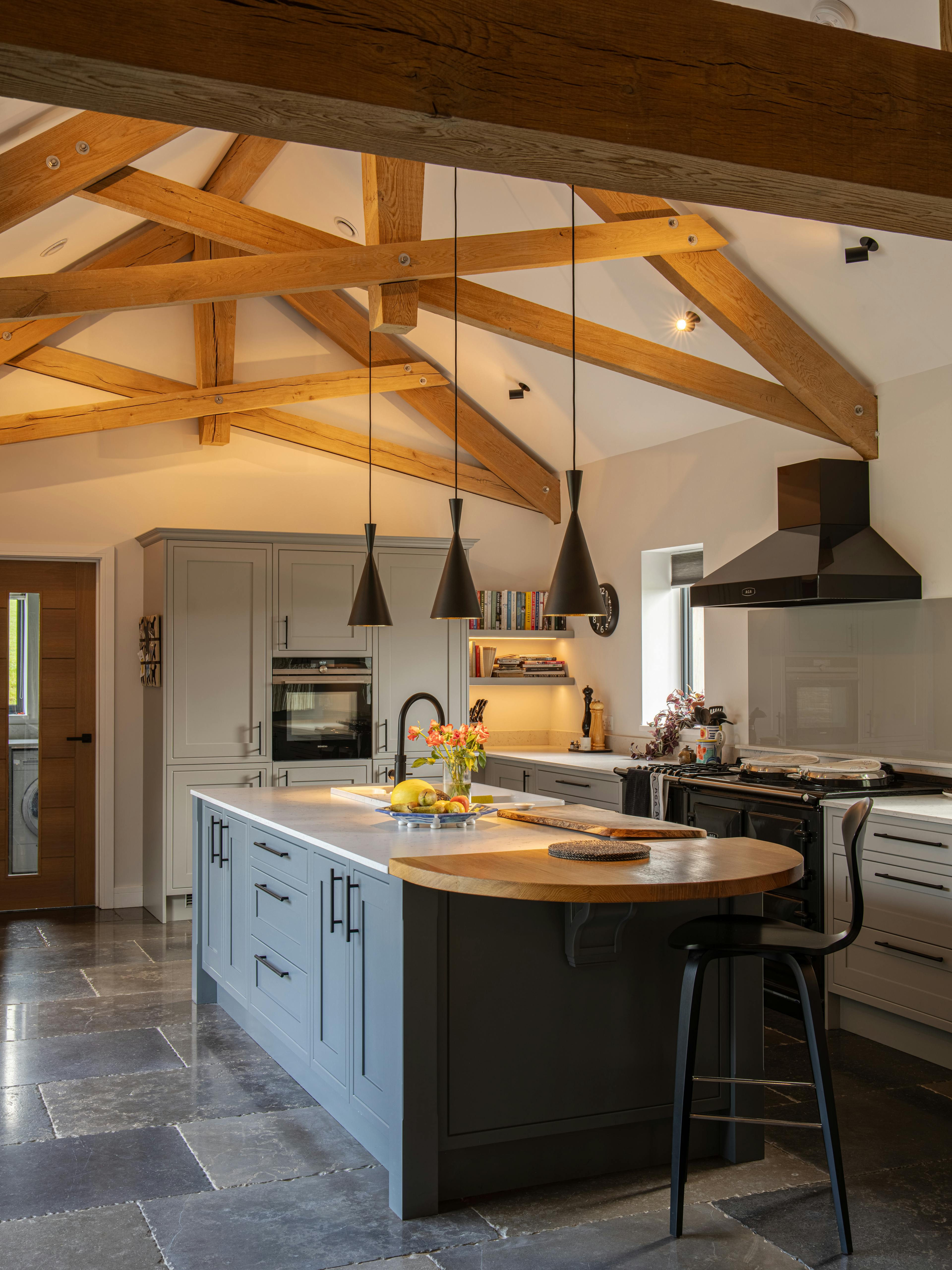 A modern oak framed kitchen with a central island