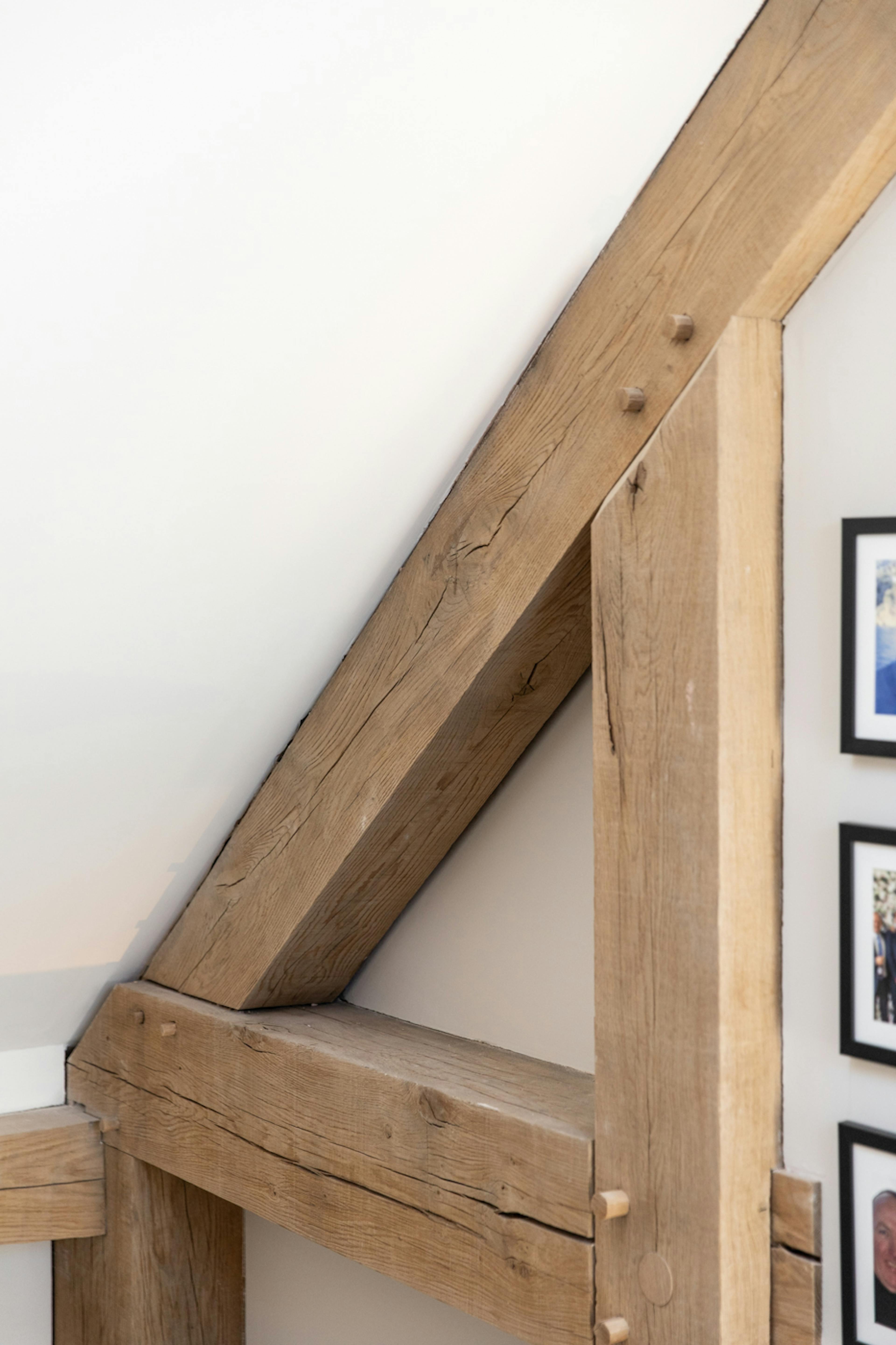 A detail of an oak post on a landing - an interrupted tie