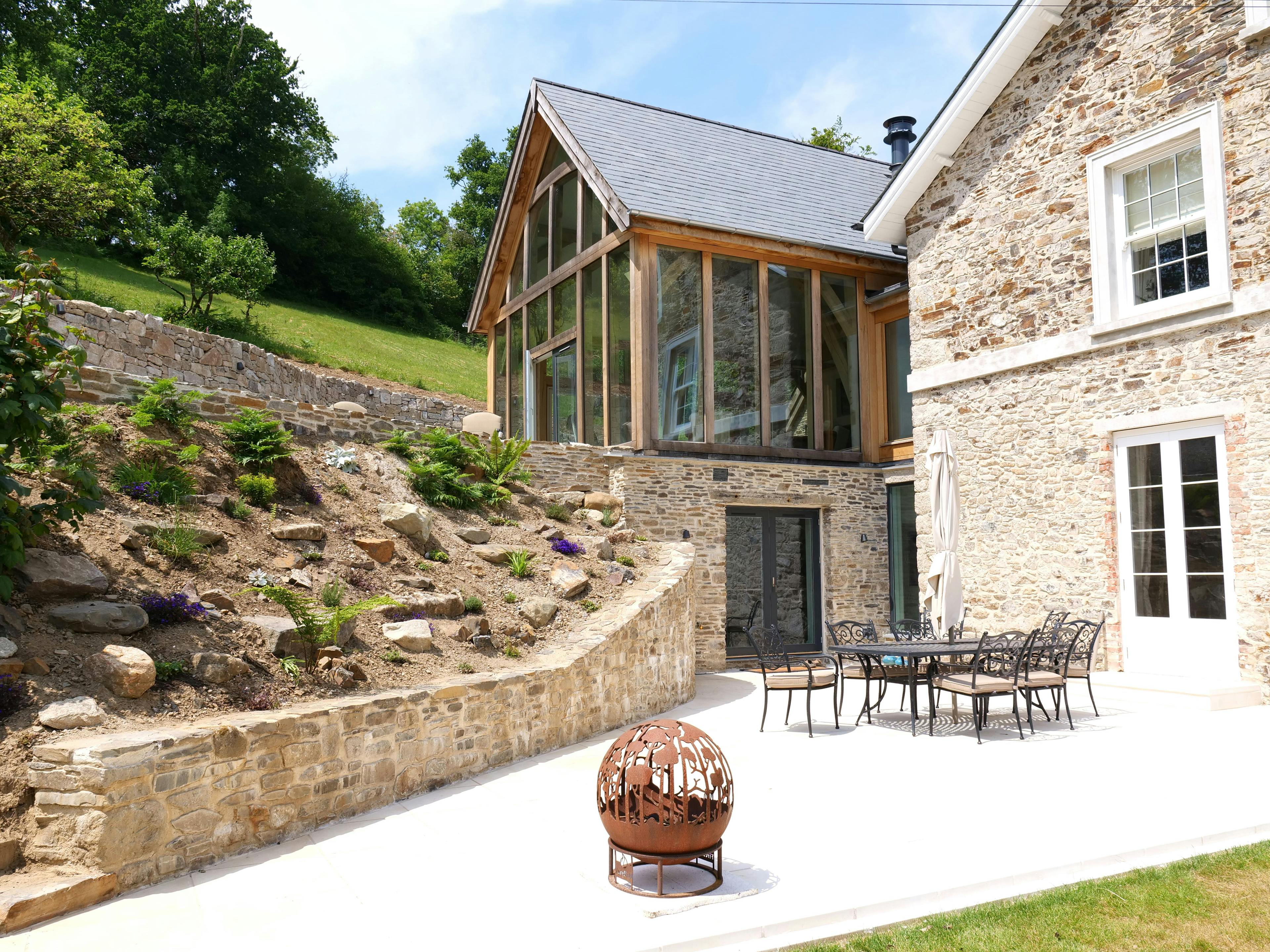 An oak framed extension to an old stone farmhouse