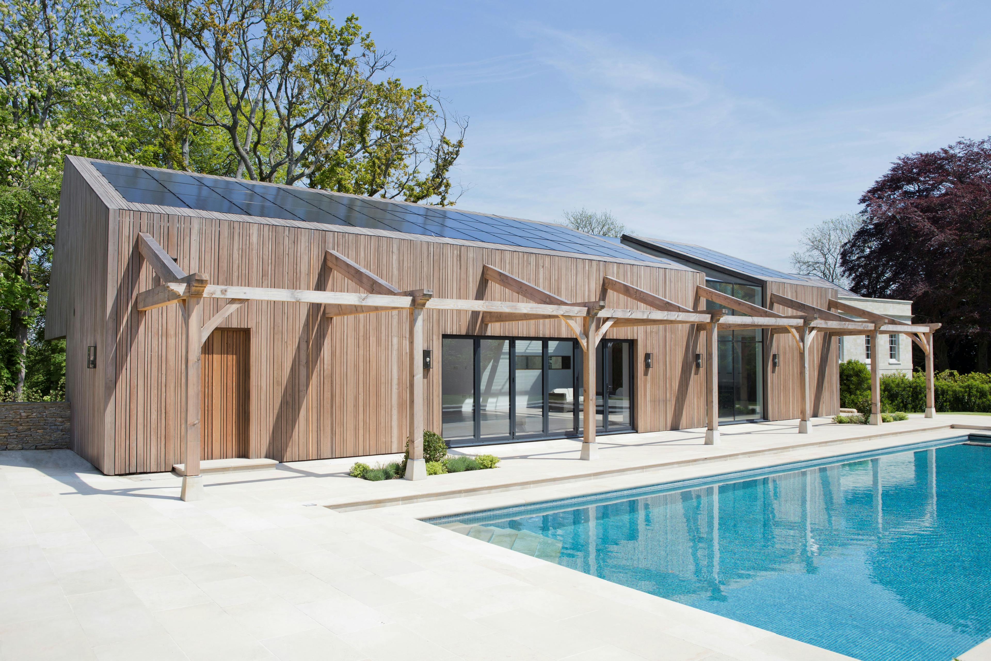External image of swimming pool building with oak framed pergola