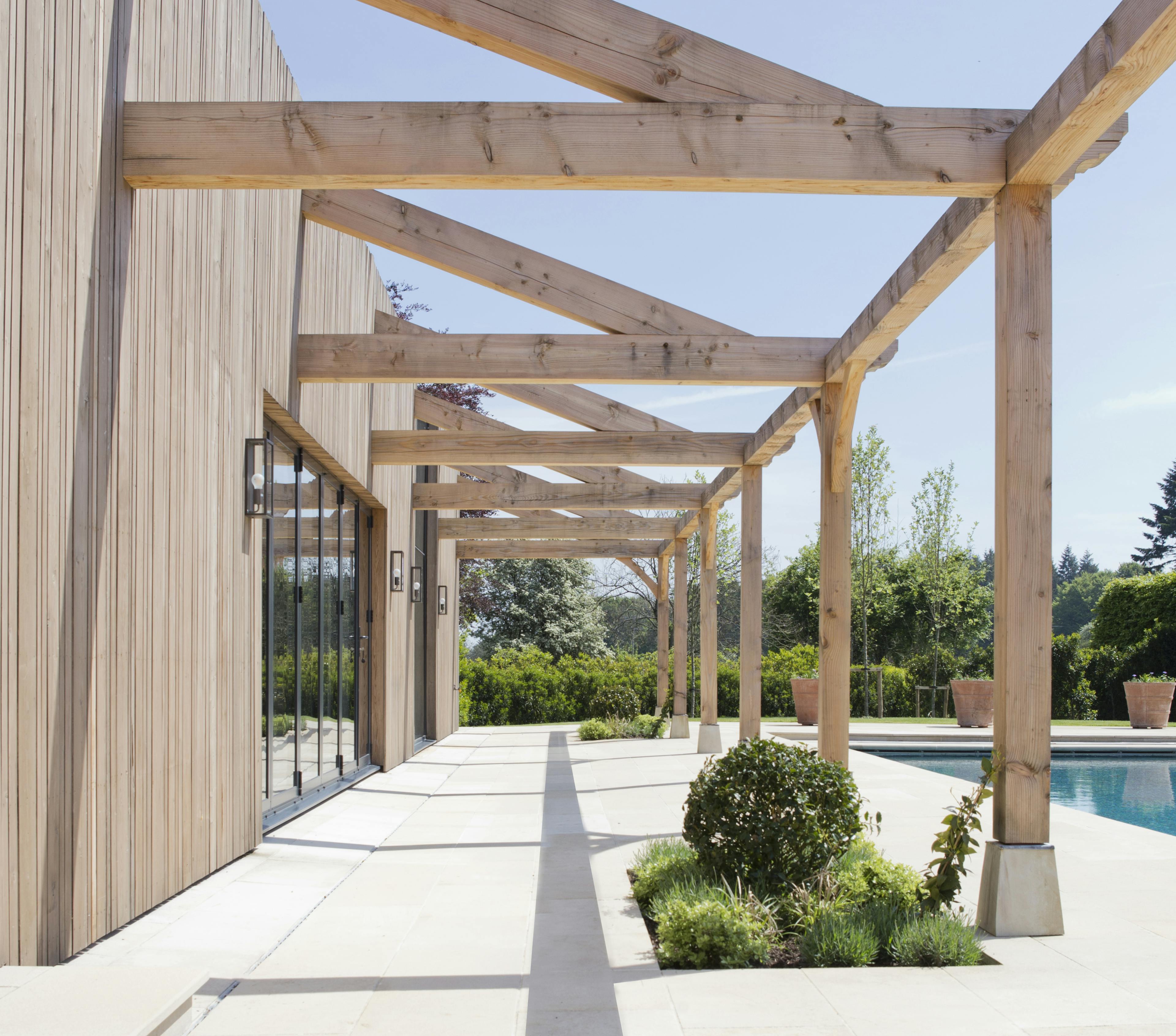 External image of swimming pool building with oak framed pergola