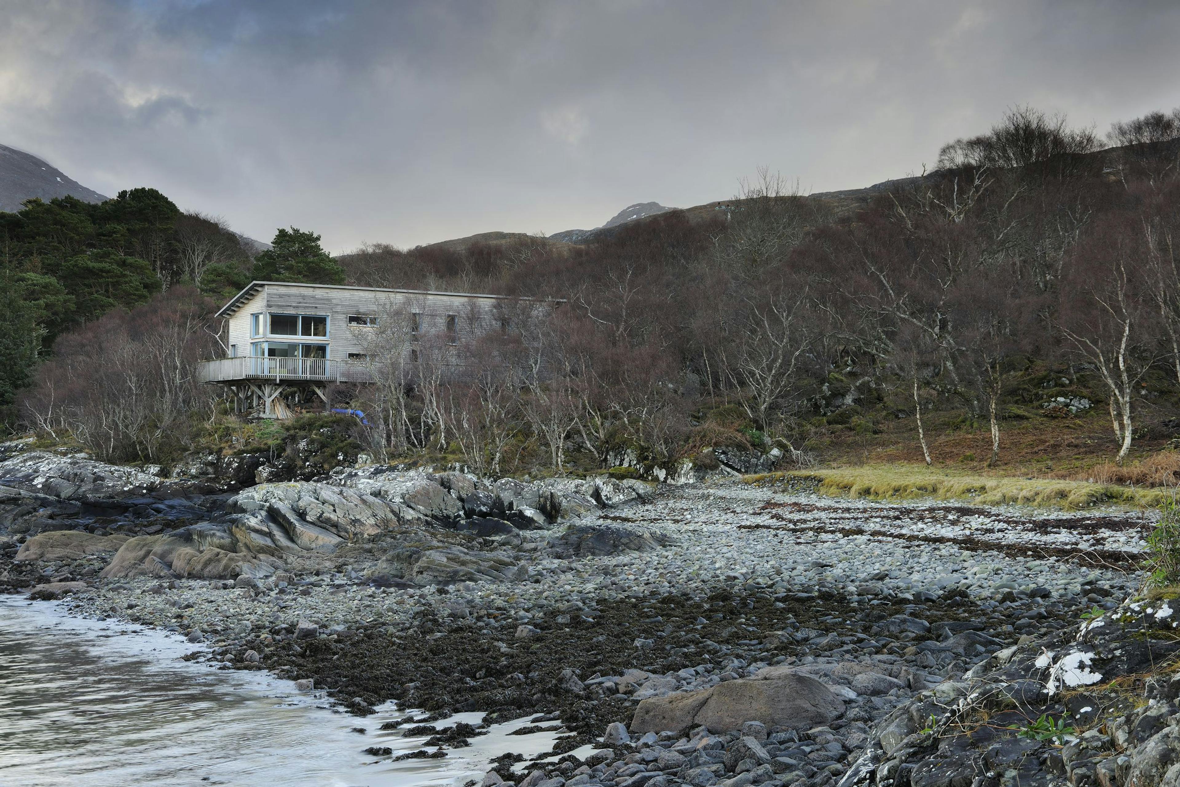 Exterior image of loch side timber framed home