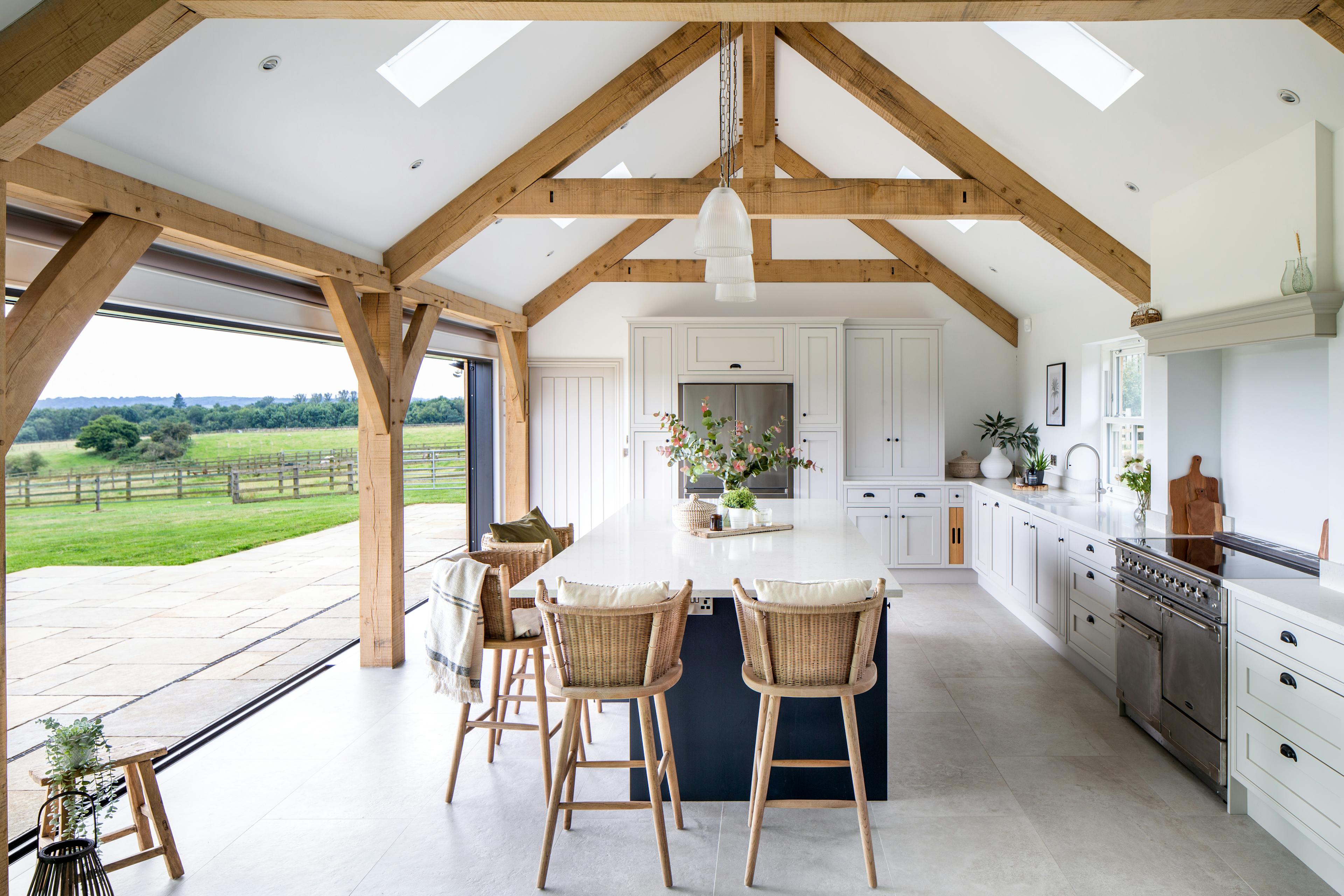 Internal view of oak framed kitchen with full length glazed elevation