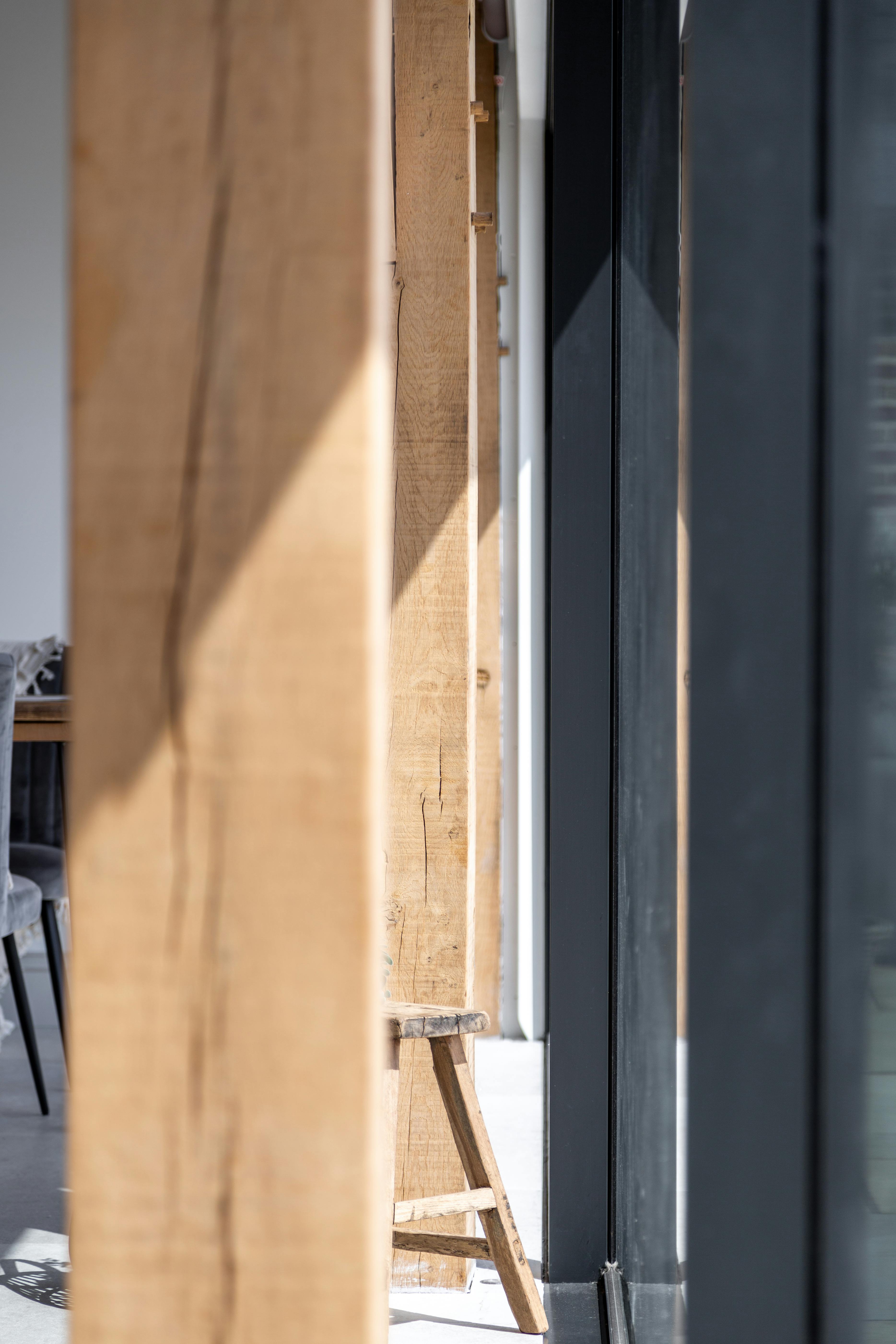 Internal view of oak framed kitchen, close up detail of joinery screen glazing