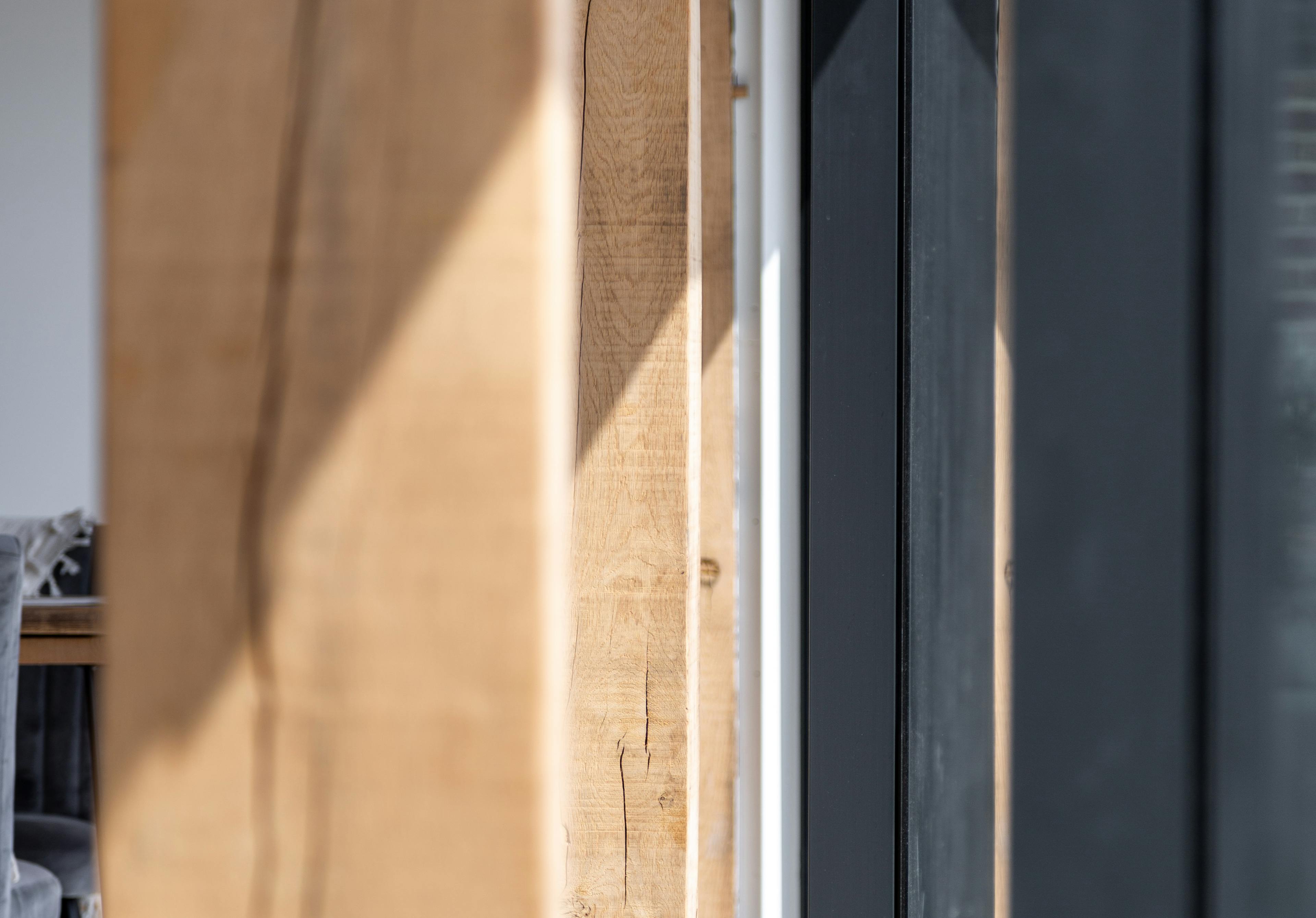 Internal view of oak framed kitchen, close up detail of joinery screen glazing