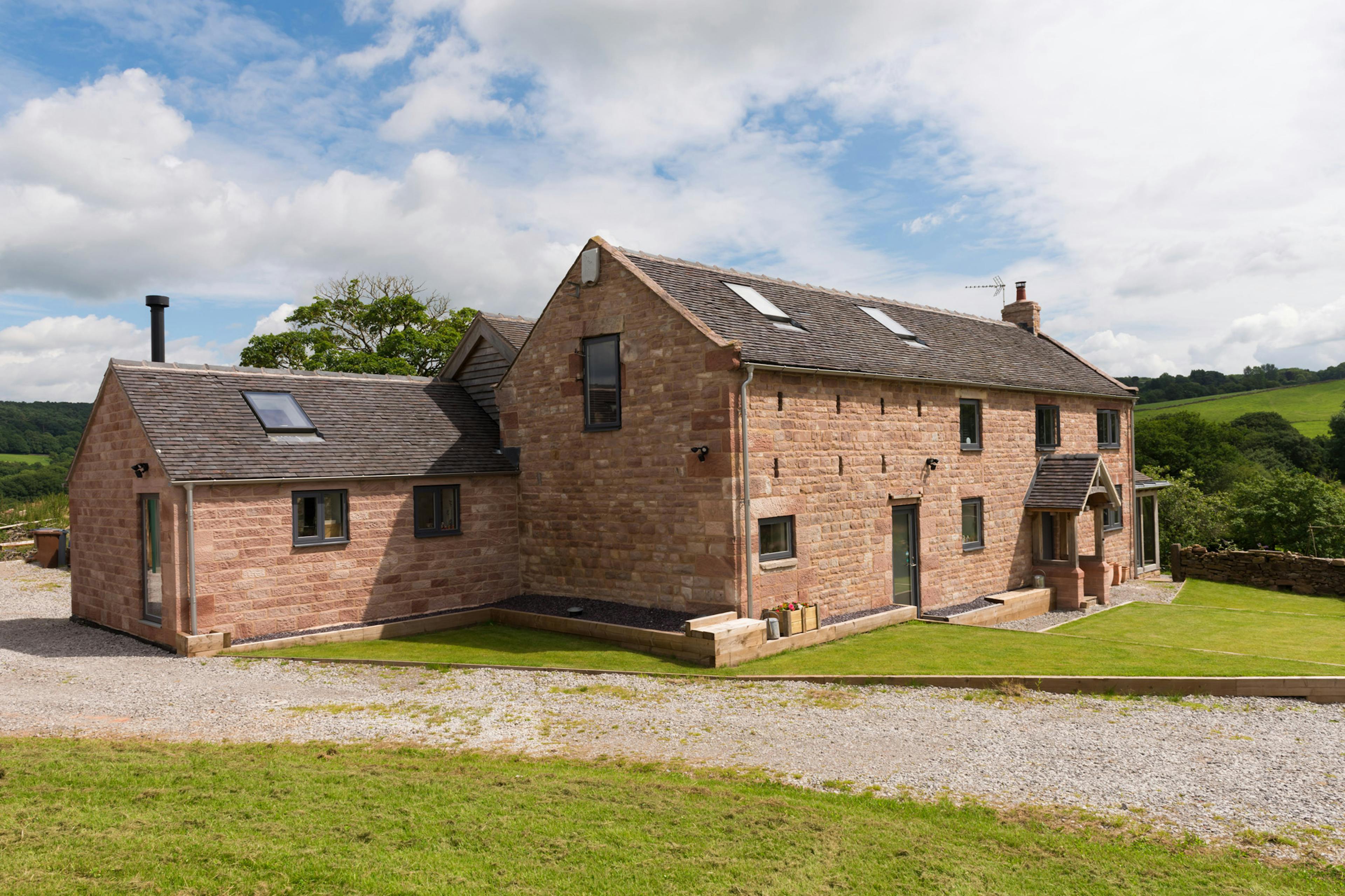 Farmhouse-style, two-story home nestled in the countryside