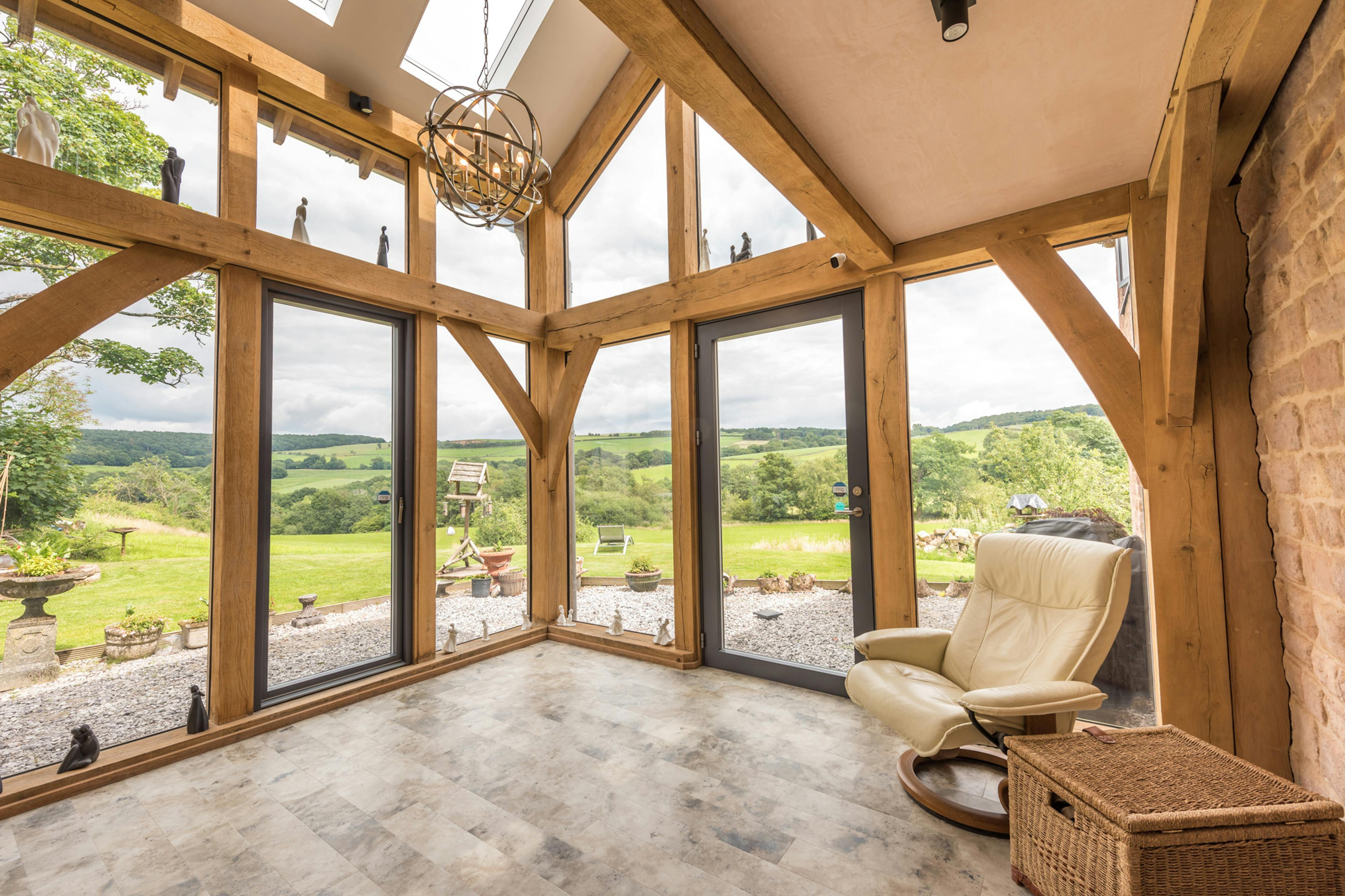 Interior view of a fully direct-glazed, oak-framed space