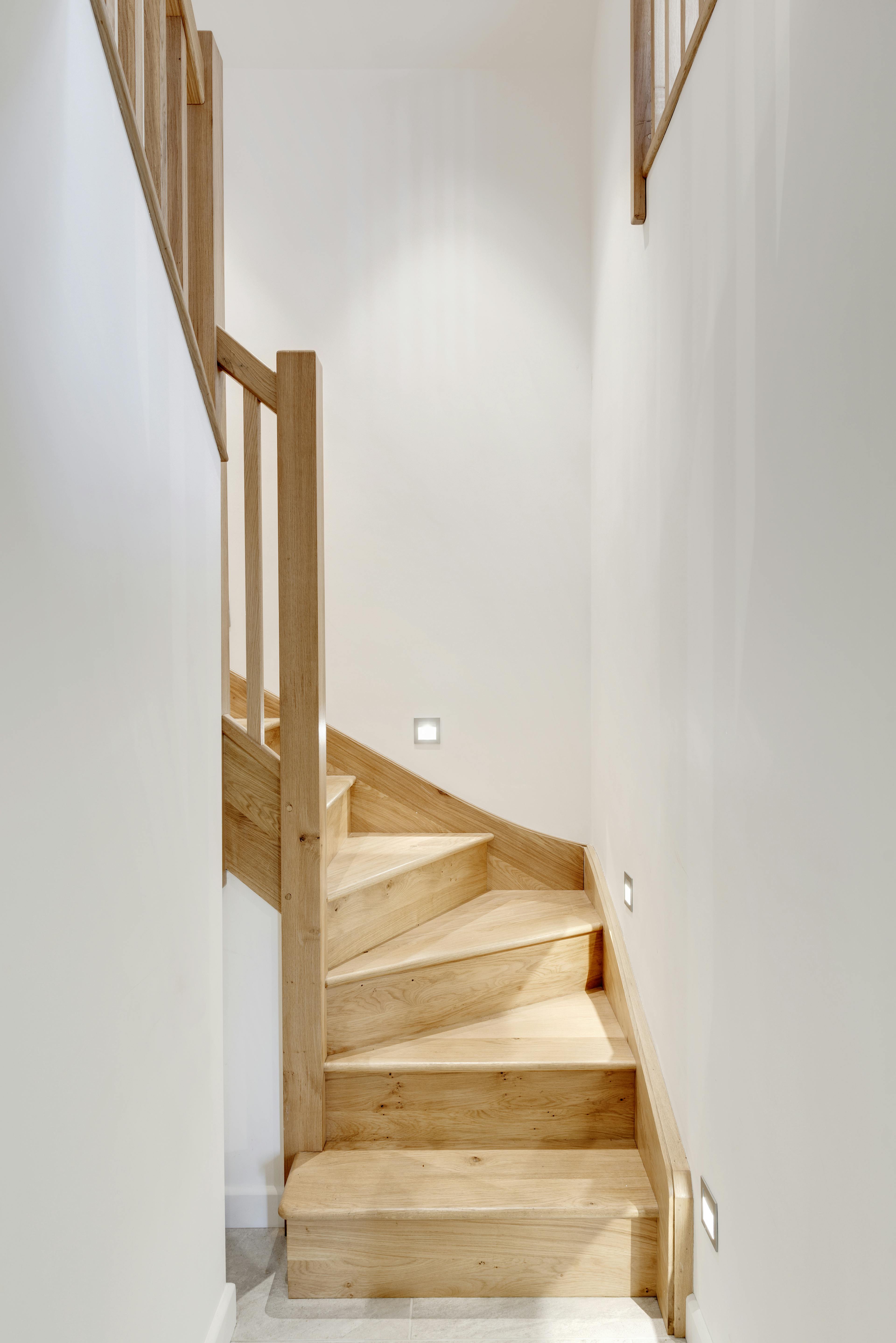 Elegant interior view of a beautifully crafted oak spiral staircase