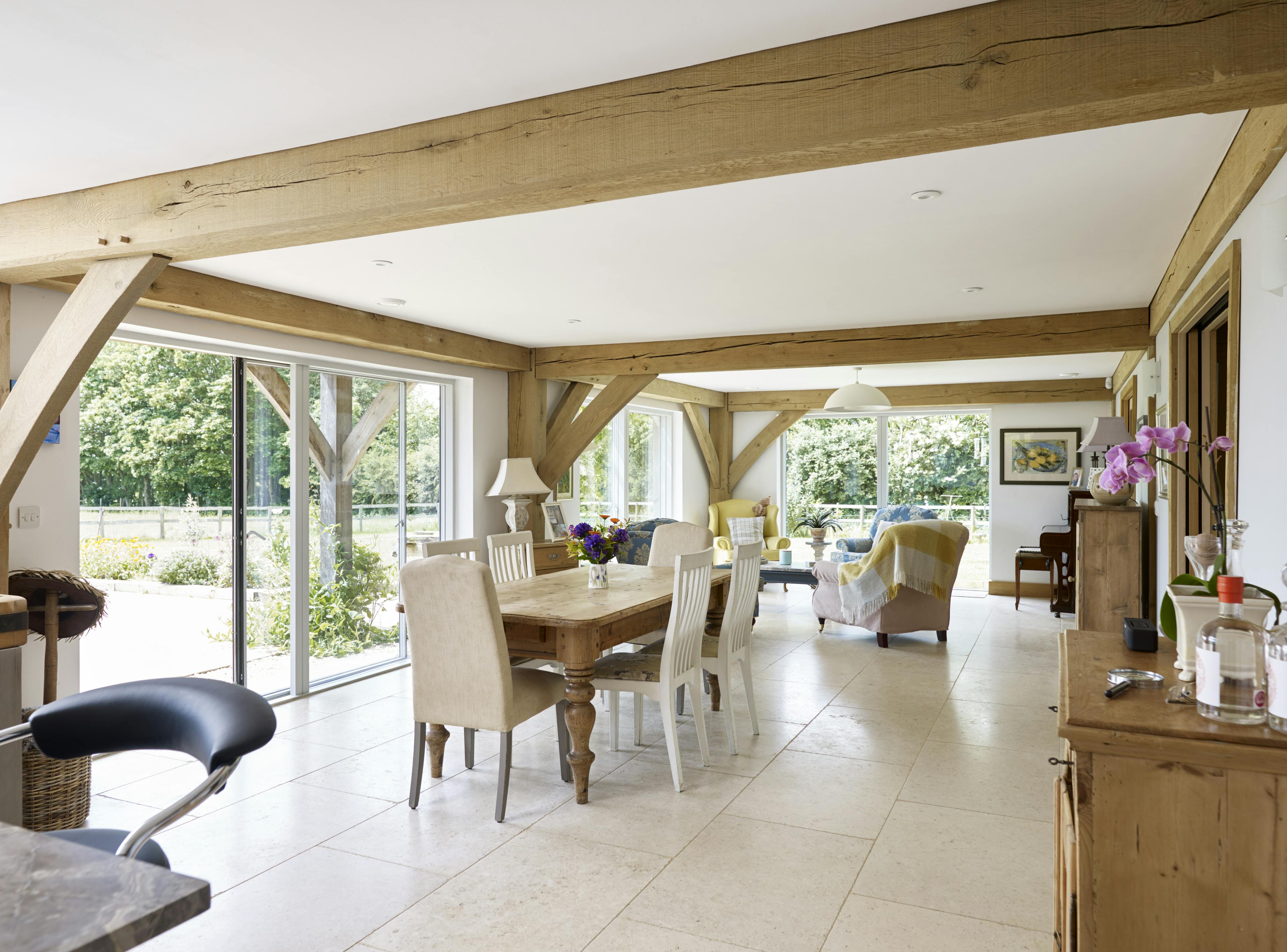 An oak framed dining area and sitting area