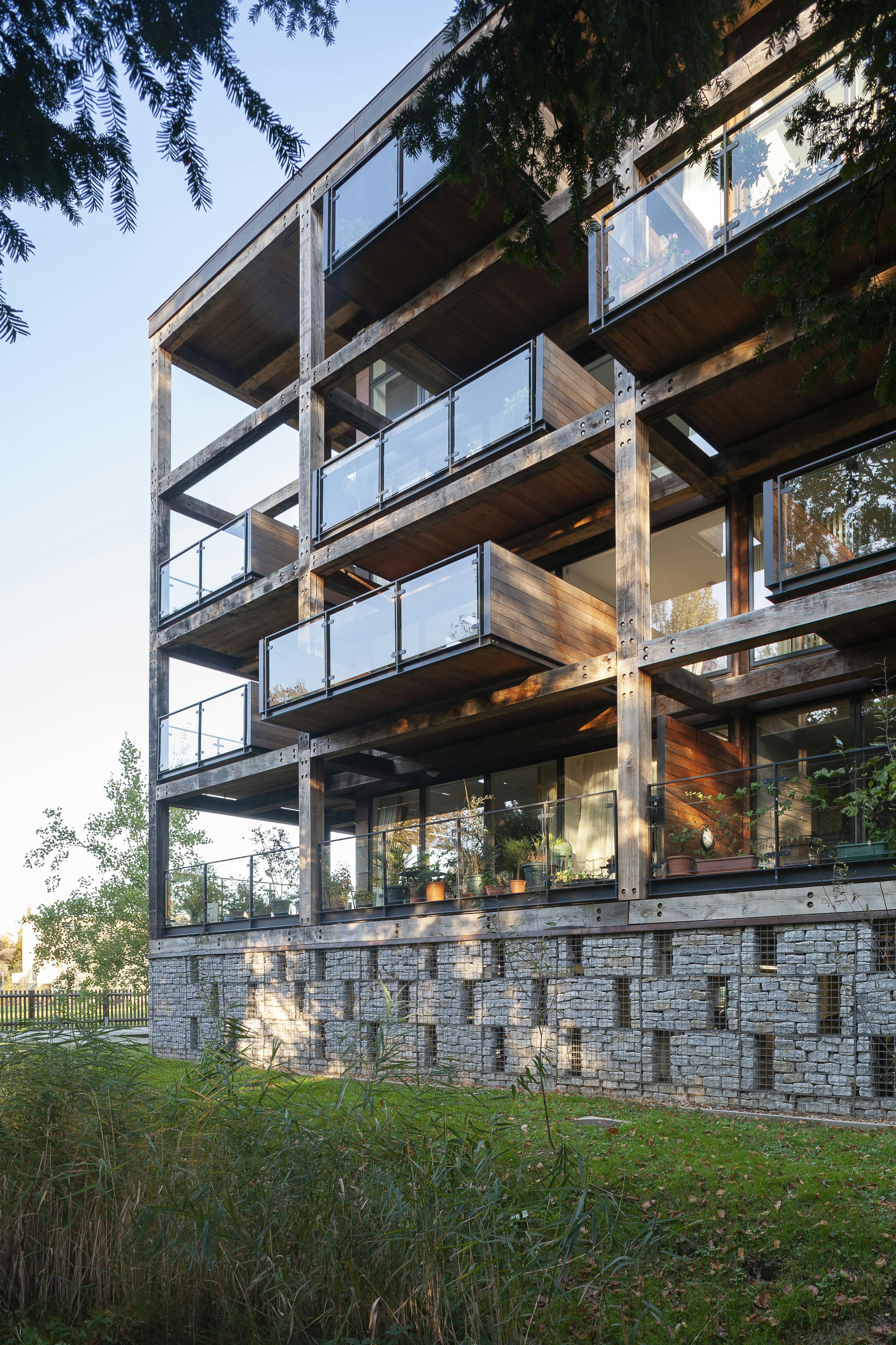 Exterior view of oak-framed balconies secured with steel flitch plates